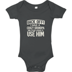 Black baby onesie with white text on a white background