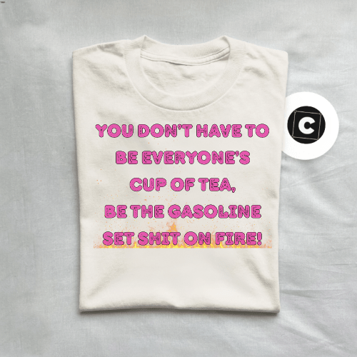 White t-shirt with pink and yellow text on a gray background