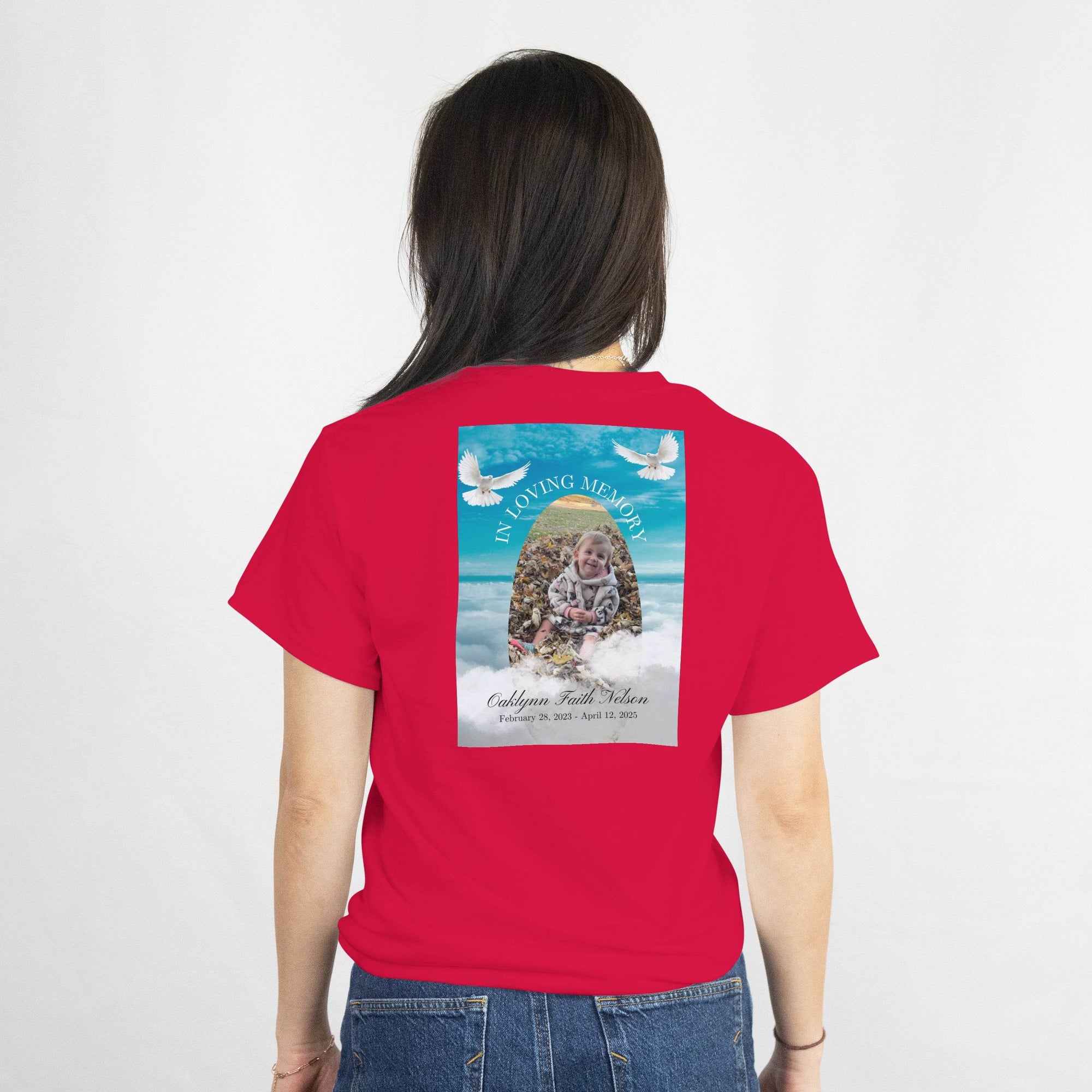 Red t-shirt back design with memorial photo, In Loving Memory arch, gentle doves, customizable name and dates.