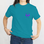Teal memorial t-shirt with purple wings and In loving memory of Oaklynn on the chest.