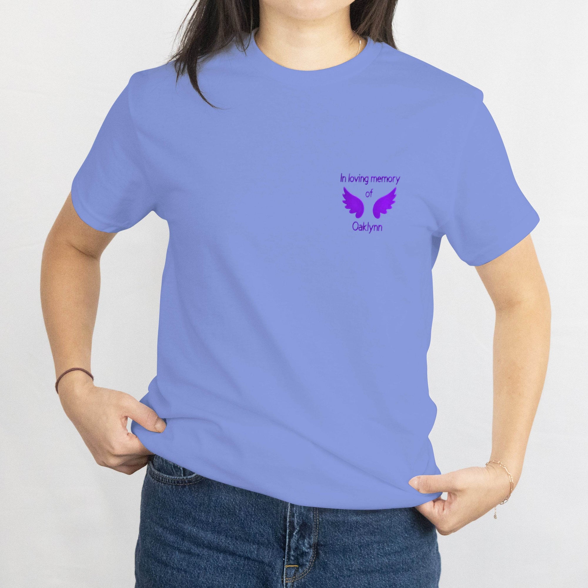 Light purple tee with a chest memorial logo: In loving memory of Oaklynn, purple wings.
