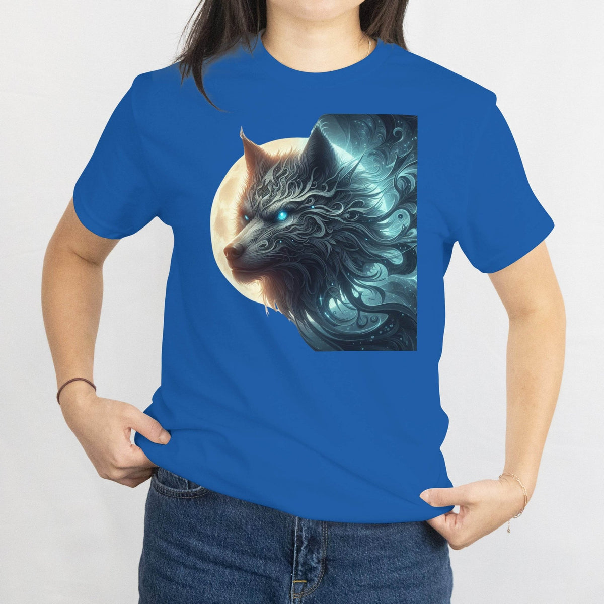 Person wearing a blue t-shirt with a dragon graphic design.