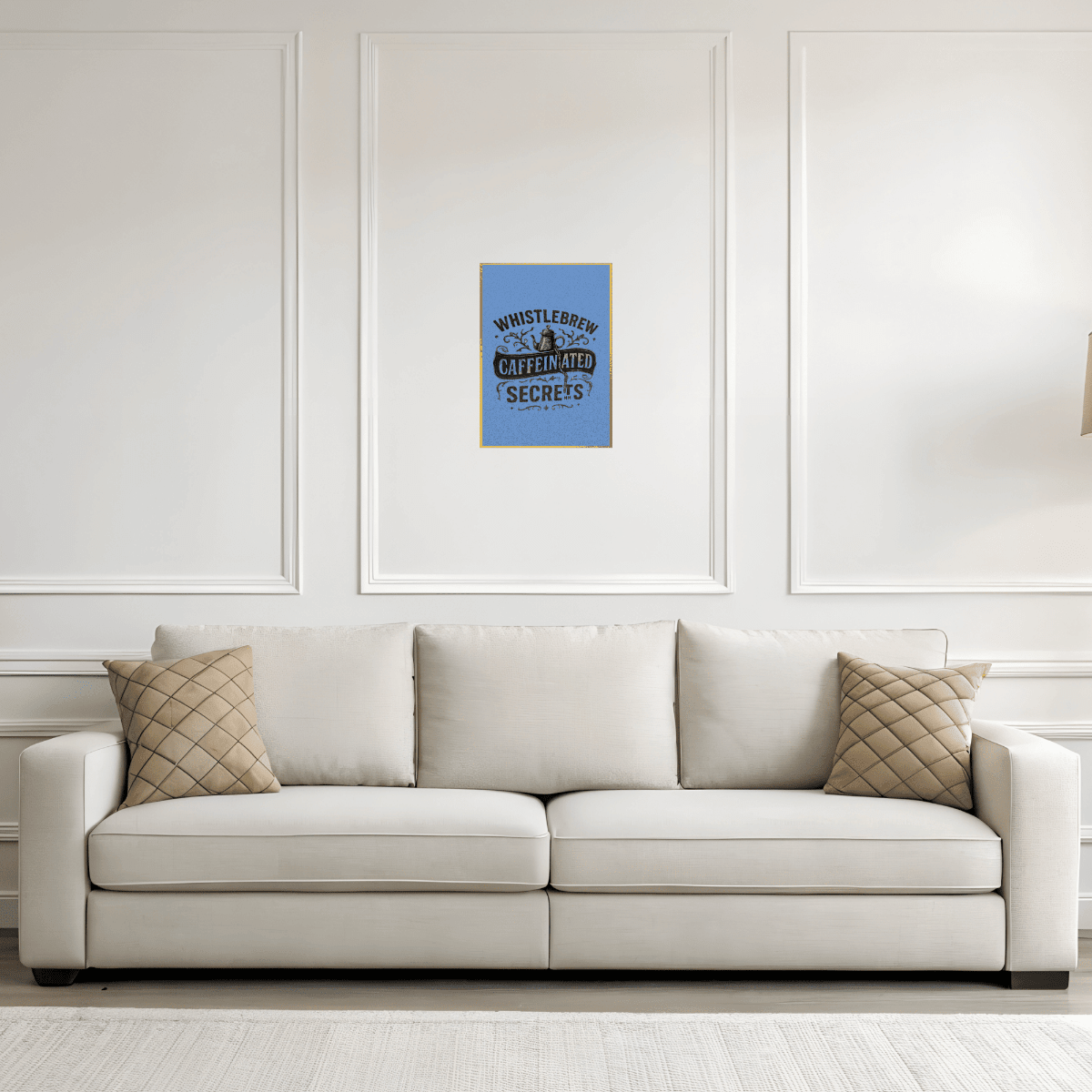 Beige sofa with decorative pillows in a room with a framed poster on the wall.