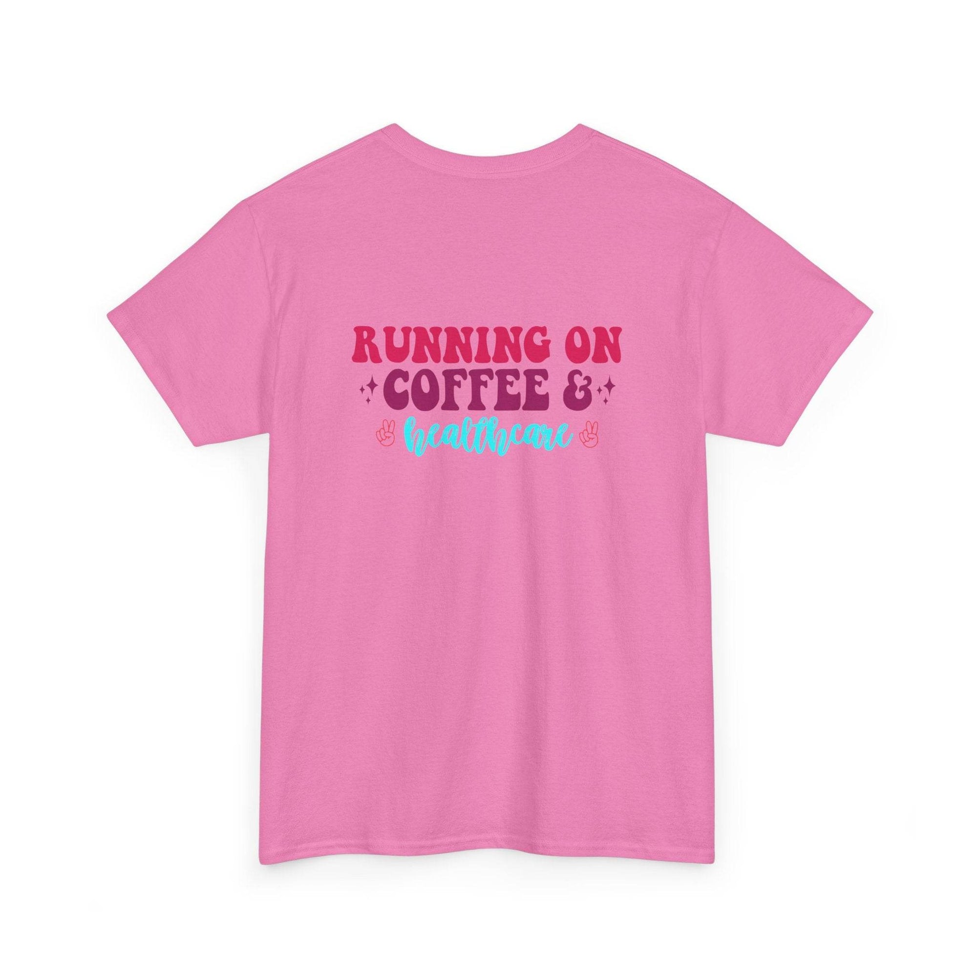 Pink T-shirt with the slogan Running on Coffee & Healthcare in brown and turquoise script.