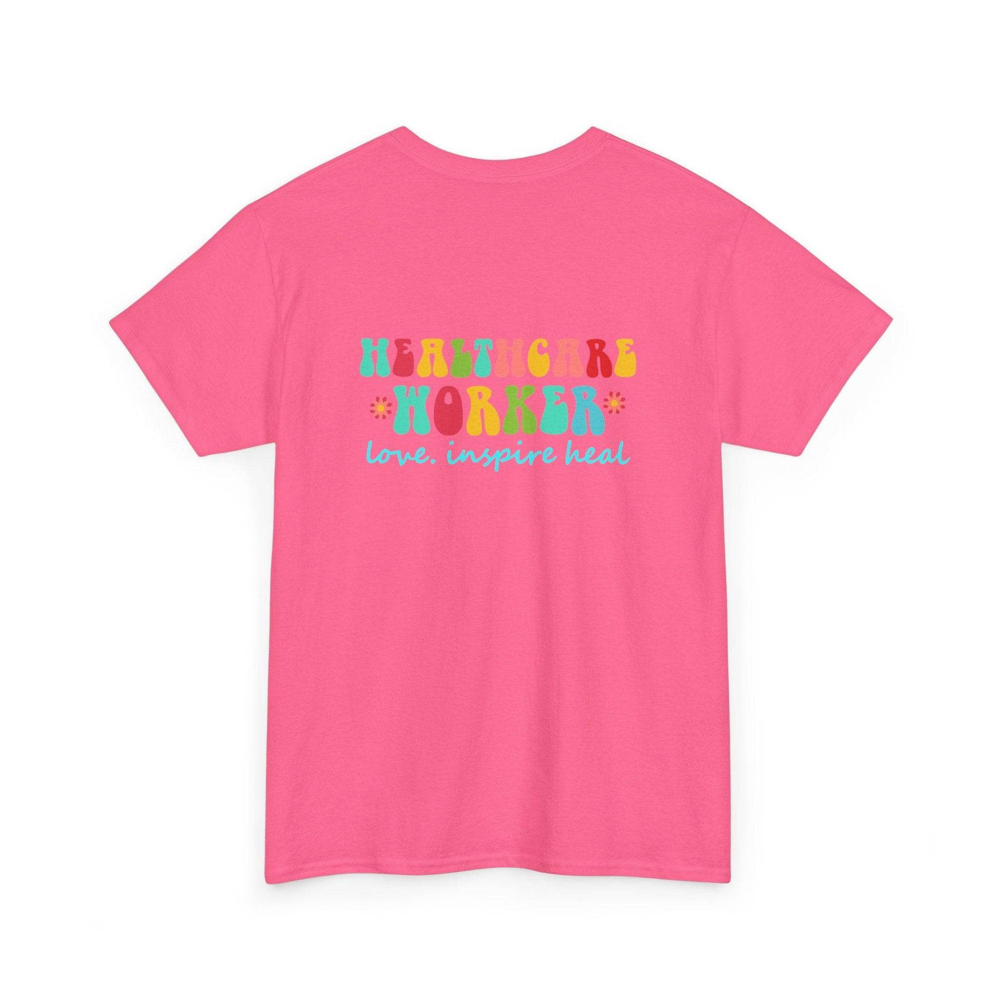 Pink Healthcare Workers T-Shirt featuring a colorful Healthcare Worker graphic and love. inspire heal slogan on back.
