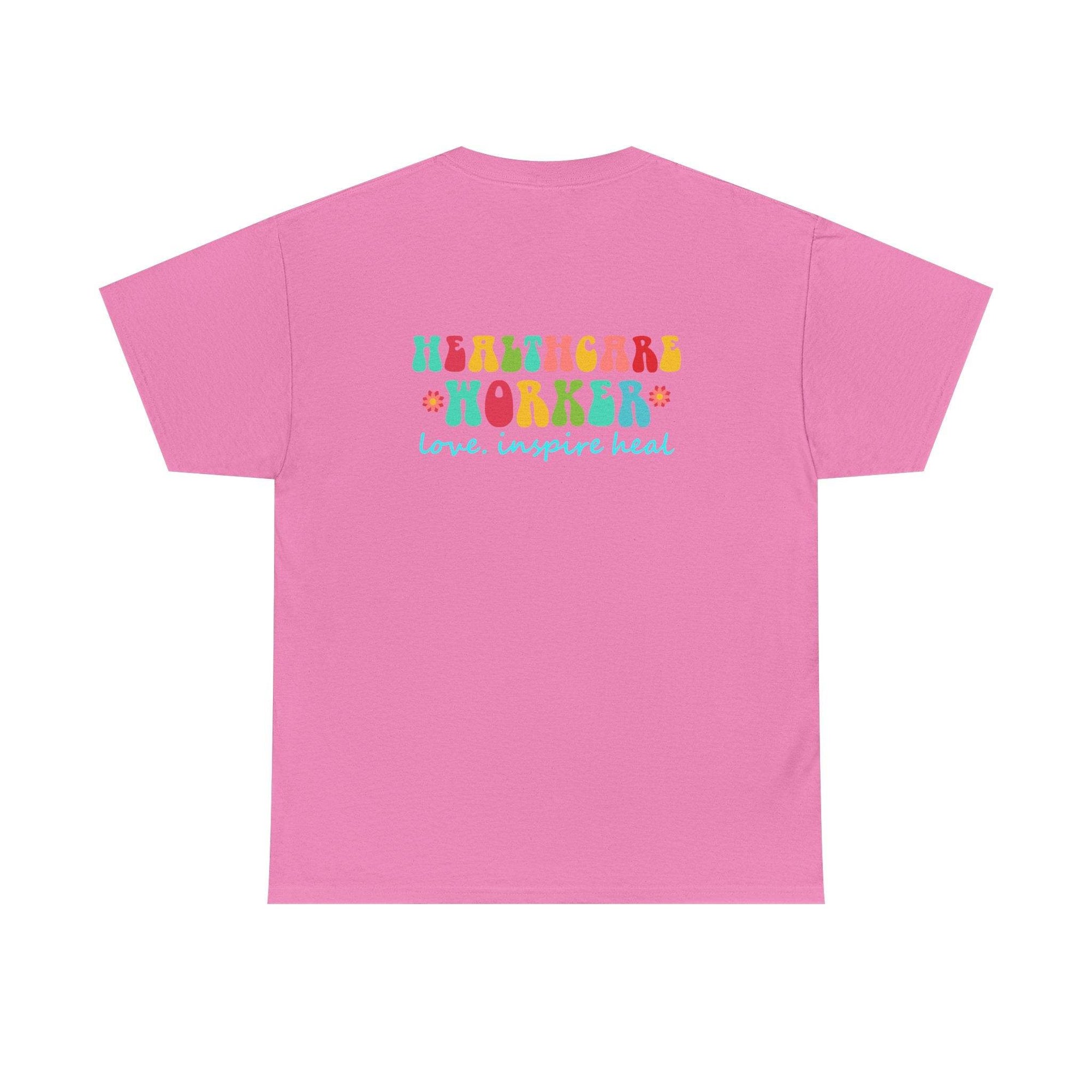 Pink healthcare workers graphic T-shirt with multicolor 'Healthcare Worker' lettering and 'love. inspire heal' slogan.