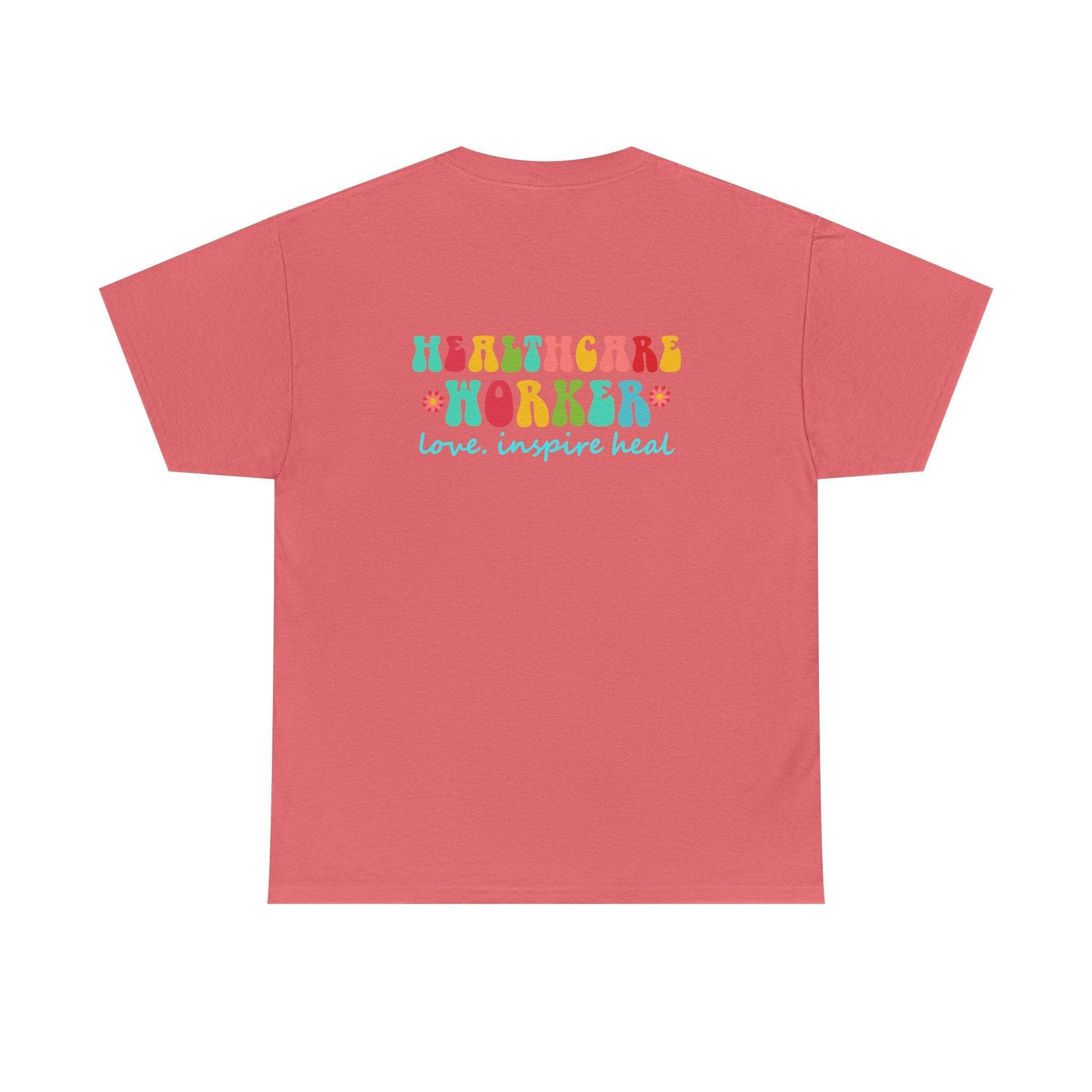 Coral pink healthcare workers T-shirt with a colorful HEALTH CARE WORKER graphic and love. inspire heal slogan.