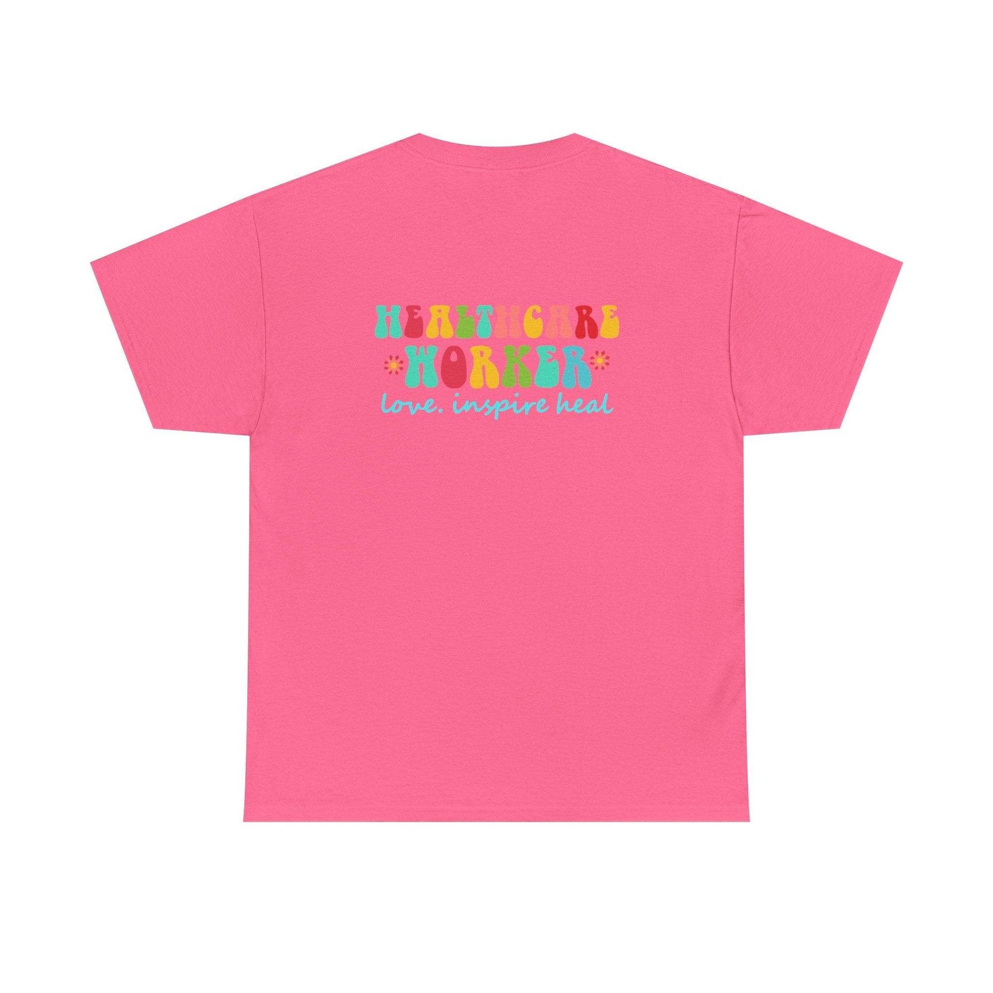 Pink Healthcare Workers T‑Shirt with colorful 'Healthcare Worker' graphic and 'love. inspire heal' slogan.