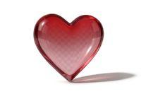 Red heart-shaped object on a white background