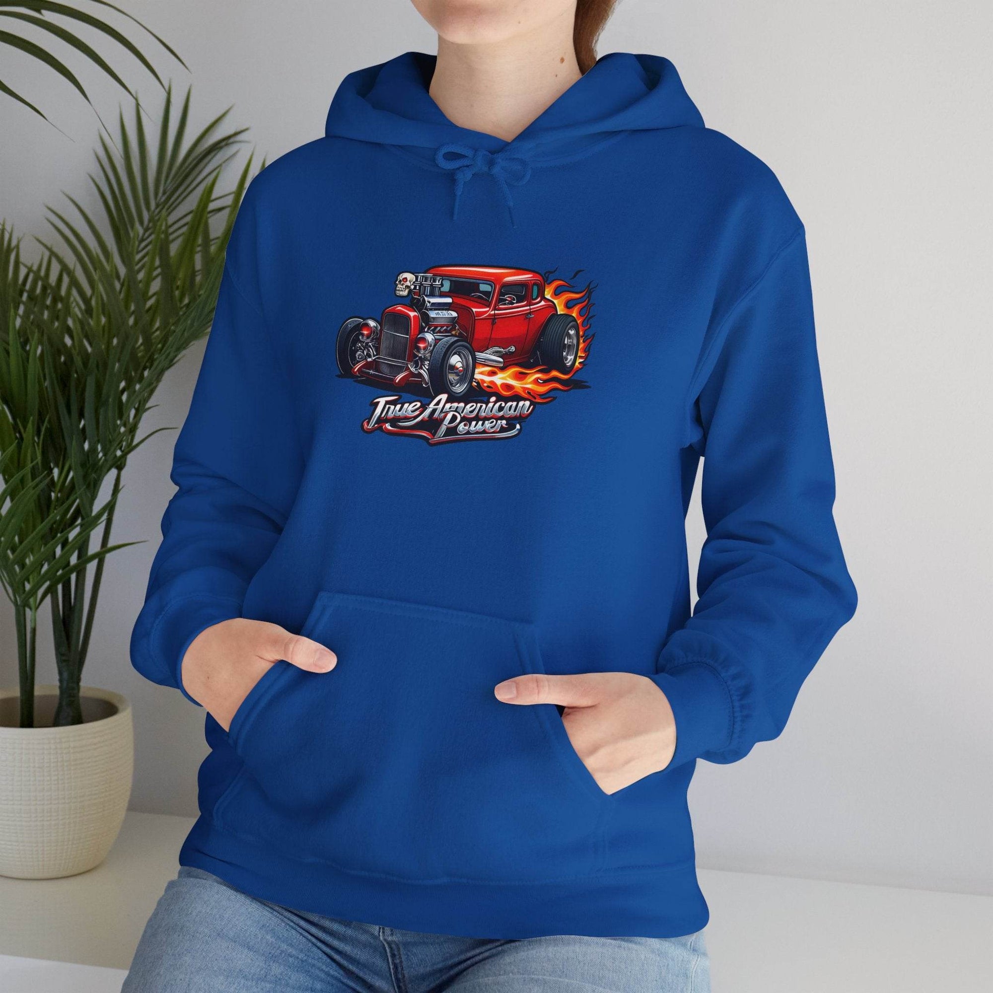 Blue hoodie featuring a red hot rod car with flames graphic.