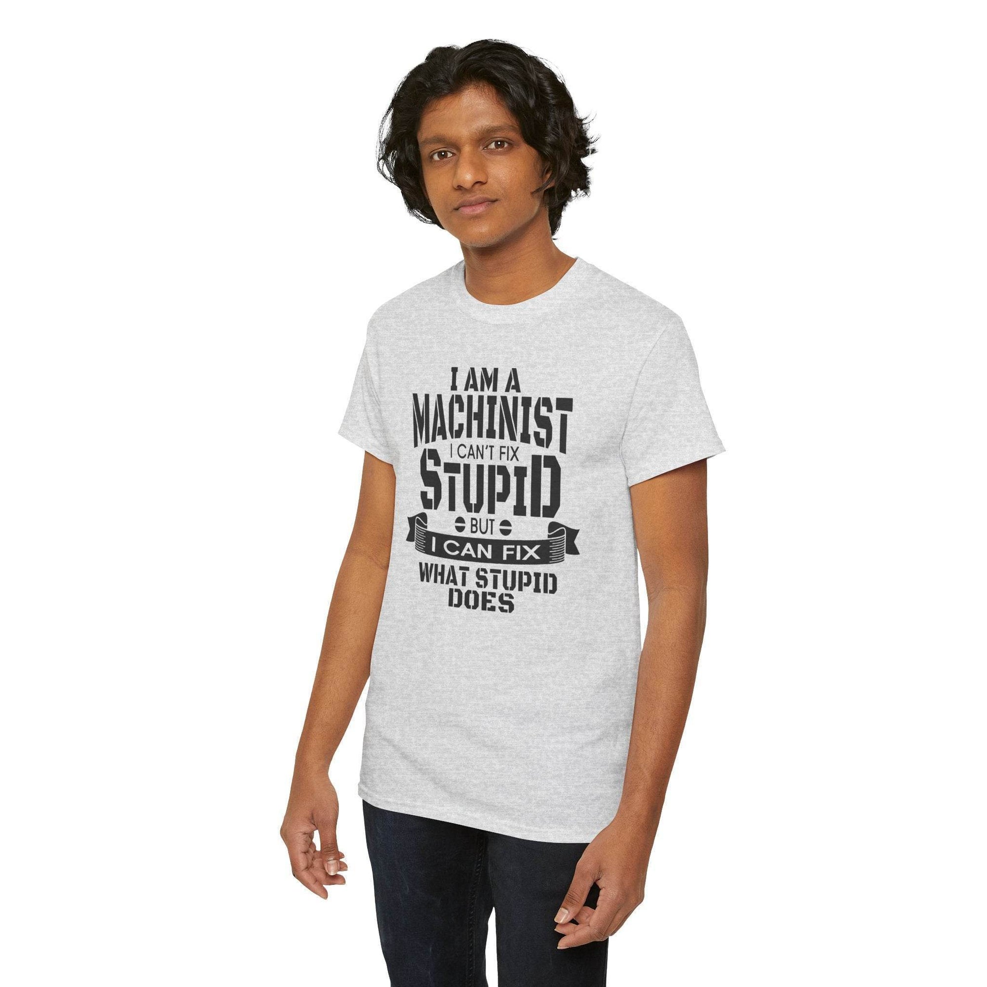 Man wearing light gray Gildan 5000 machinist T-shirt with slogan: I can’t fix stupid, but I can fix what stupid does.
