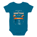 Blue baby onesie with football-themed birth announcement print featuring Home Team, name banner, and birth details.