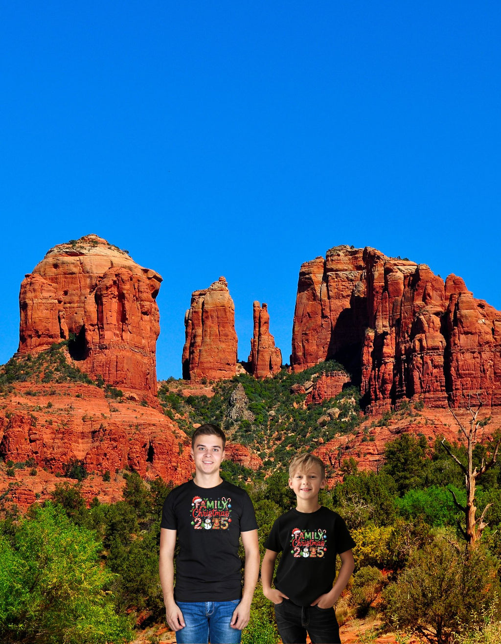 Family Christmas 2025 pictures: two boys in matching black shirts pose before red rock canyon under blue sky.