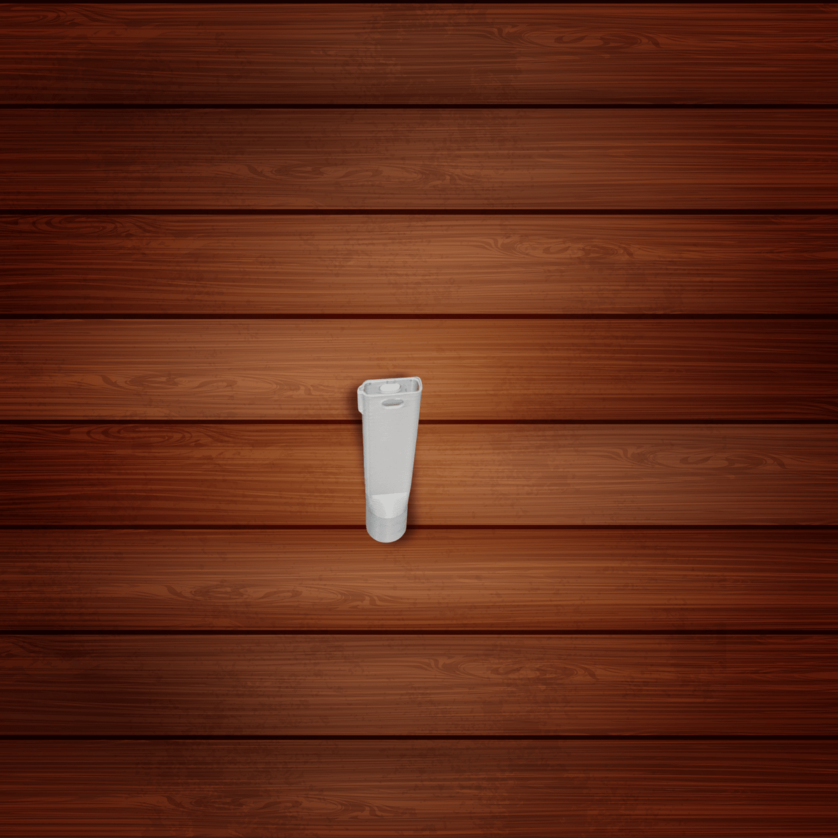 White tube on a wooden surface