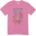 Pink T-shirt with nurse-themed graphic: LIVE LOVE HEAL, caduceus, heartbeat line, and NURSE vertical text.