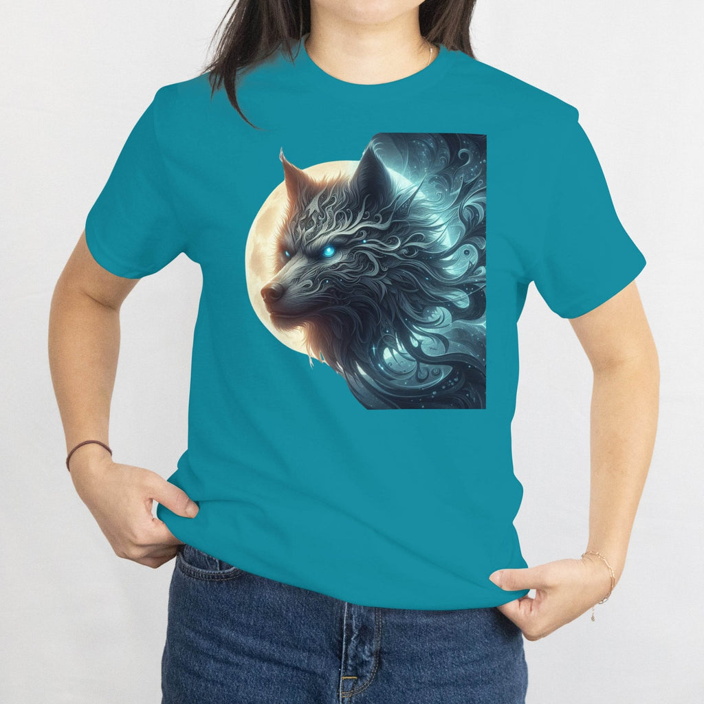Person wearing a teal t-shirt with a wolf graphic design on a plain background