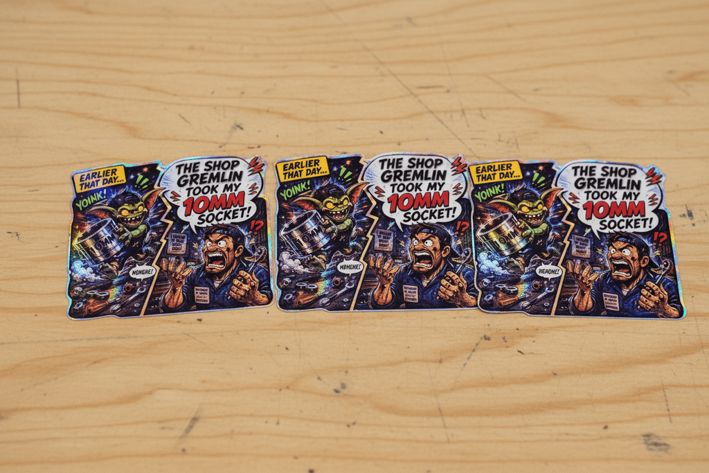 Set of five colorful trading cards featuring a character with a beard and mustache on a wooden surface.