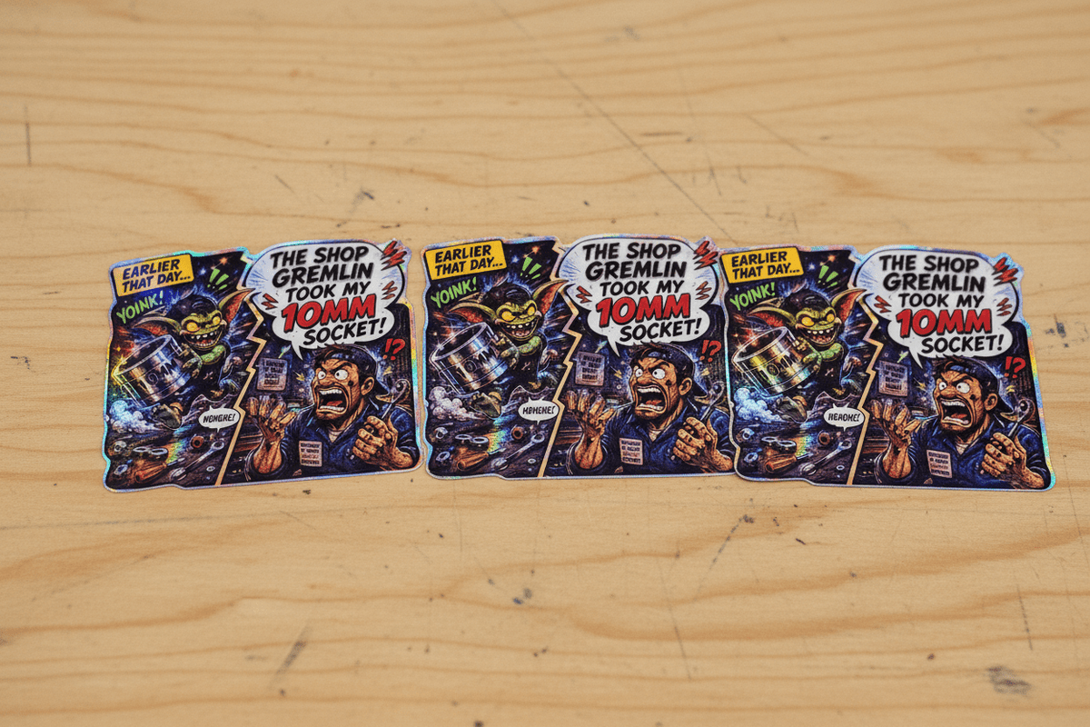 Set of five colorful trading cards featuring a character with a beard and mustache on a wooden surface.