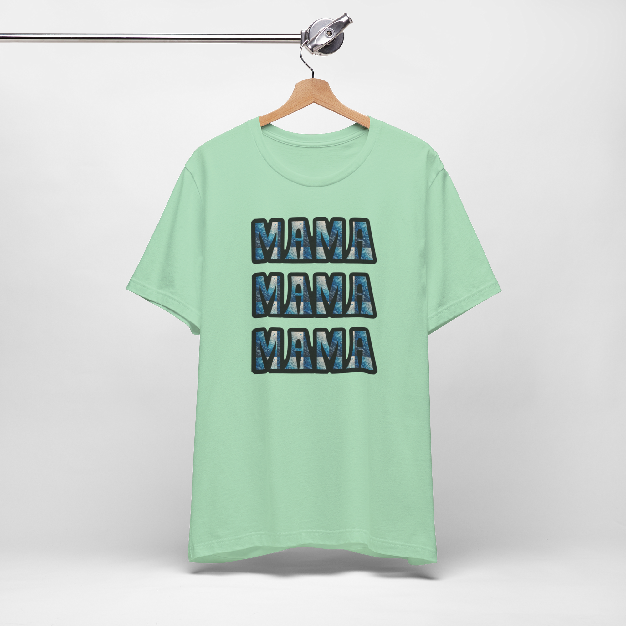 Mint green Mama Mama Mama graphic tee with three stacked MAMA designs on front.