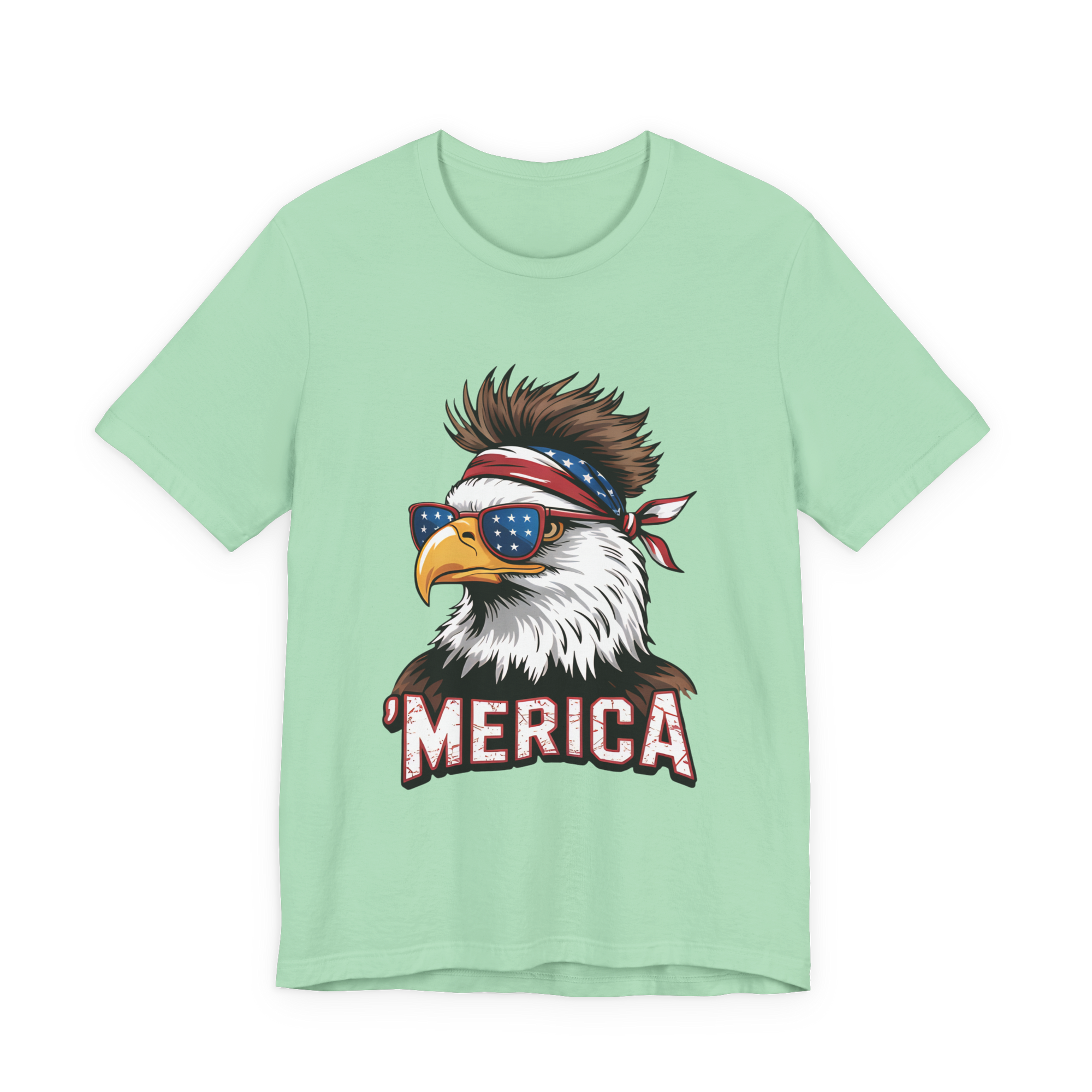 Mint green unisex tee with bold eagle graphic wearing star-spangled sunglasses and bandana, MERICA text.
