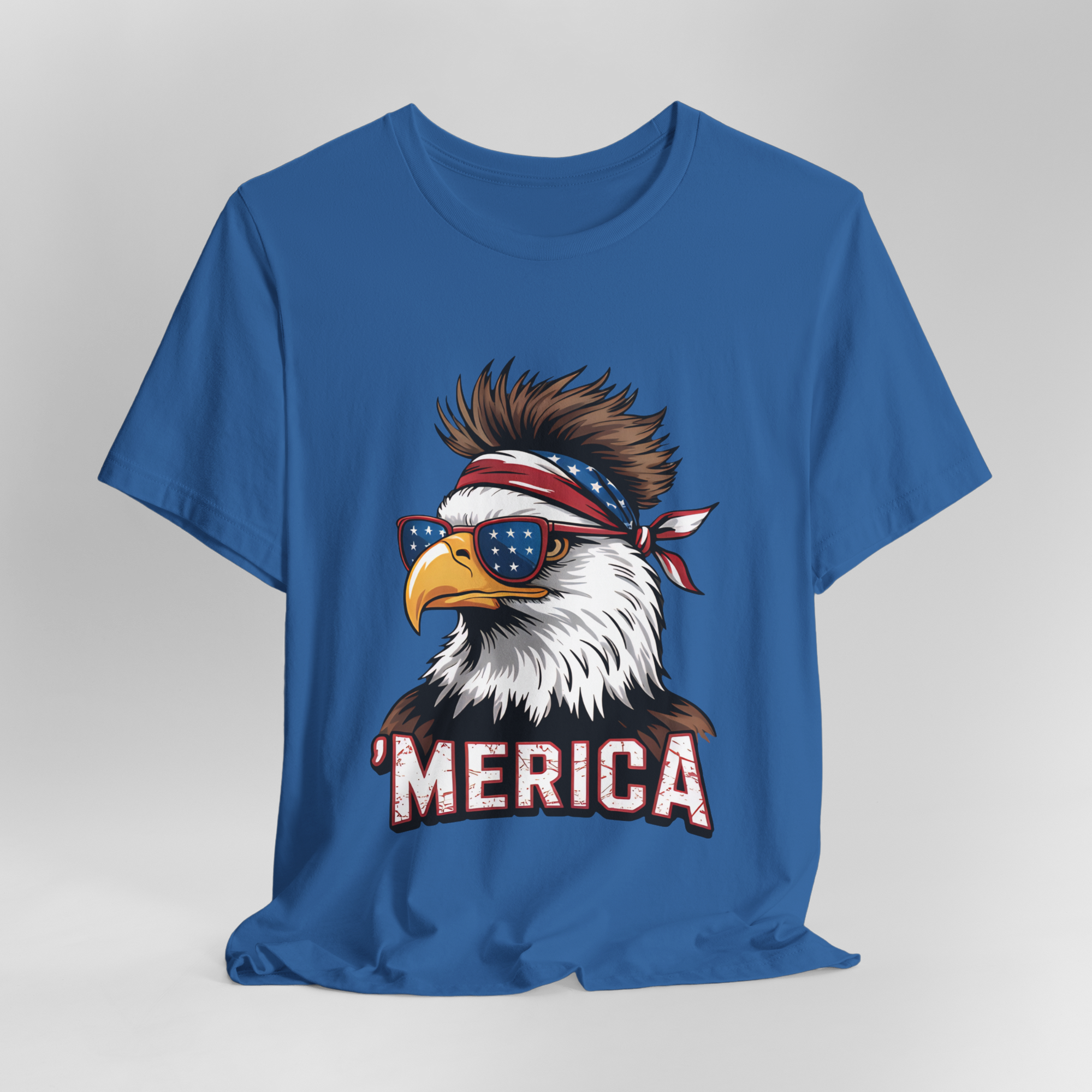 Blue Bella Canvas tee with patriotic eagle wearing star-spangled sunglasses and a bandana reading MERICA.