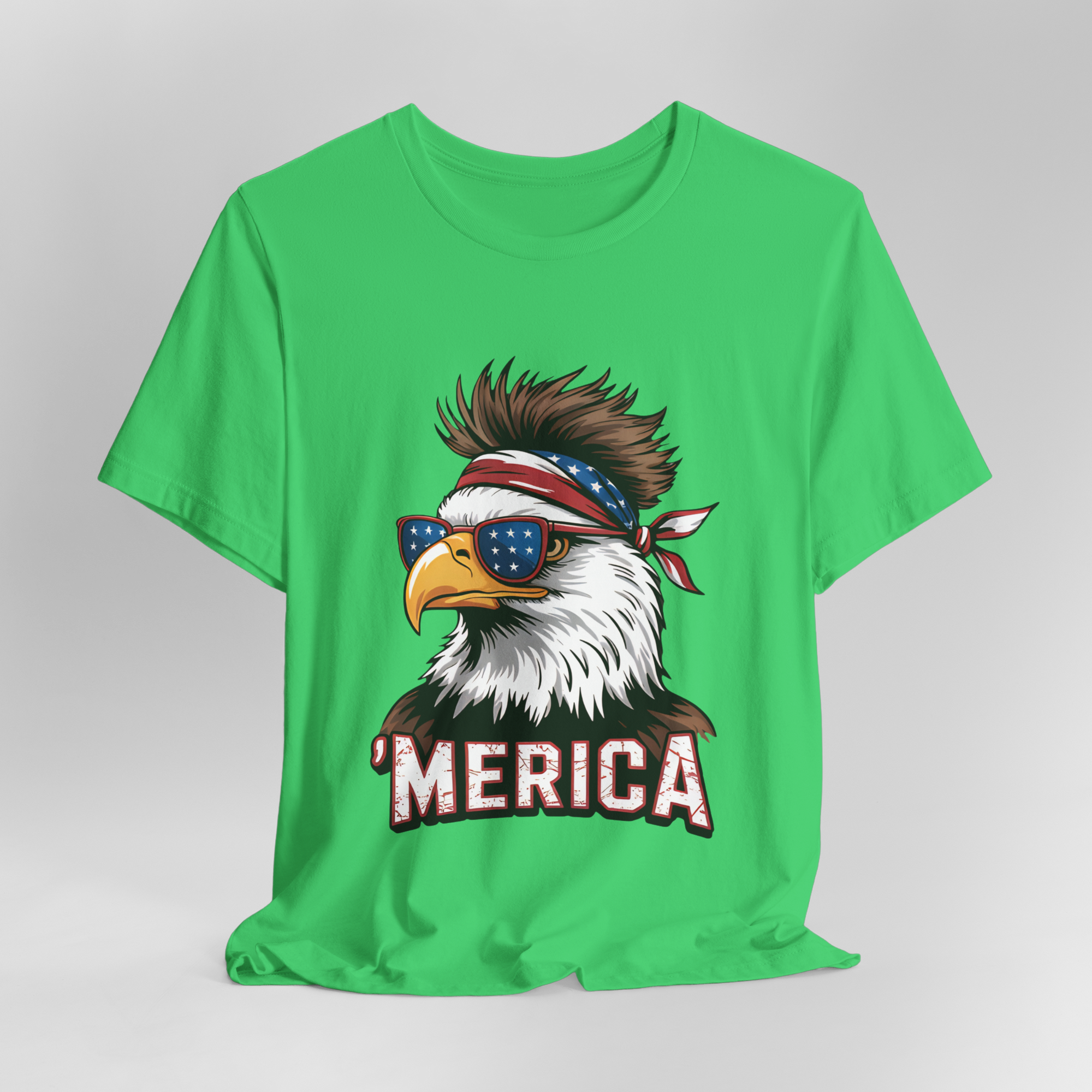 Bright green T-shirt with a Merica eagle wearing star-spangled sunglasses and a red-white-blue bandana, MERICA text.
