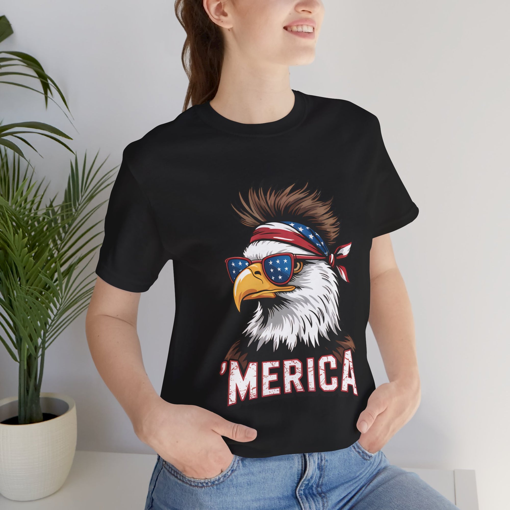 D&L Merica Eagle Bella Canvas unisex black tee with eagle graphic, star sunglasses, red bandana, MERICA text.