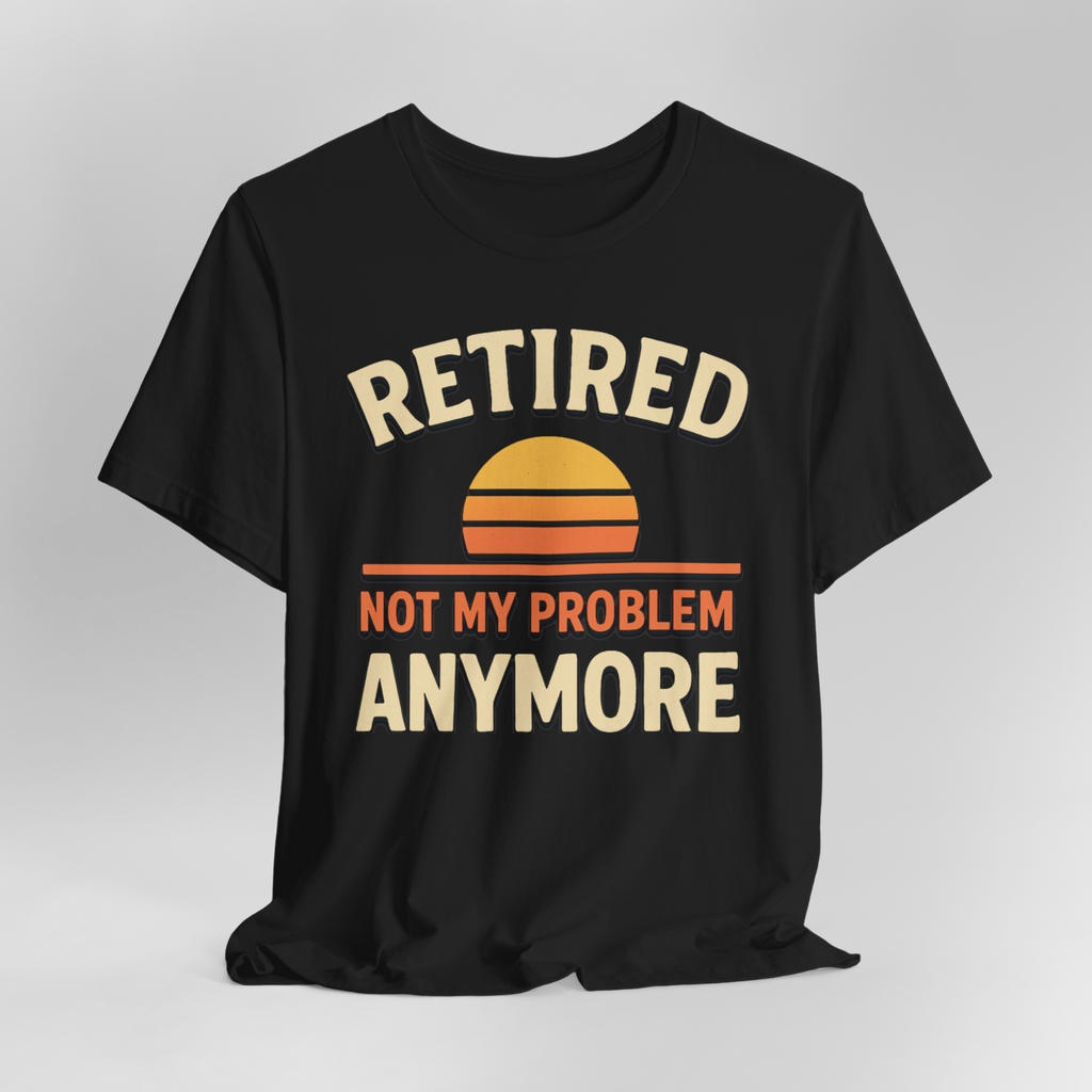 Black T-shirt with retro sunset graphic and bold text: Retired not my problem anymore.