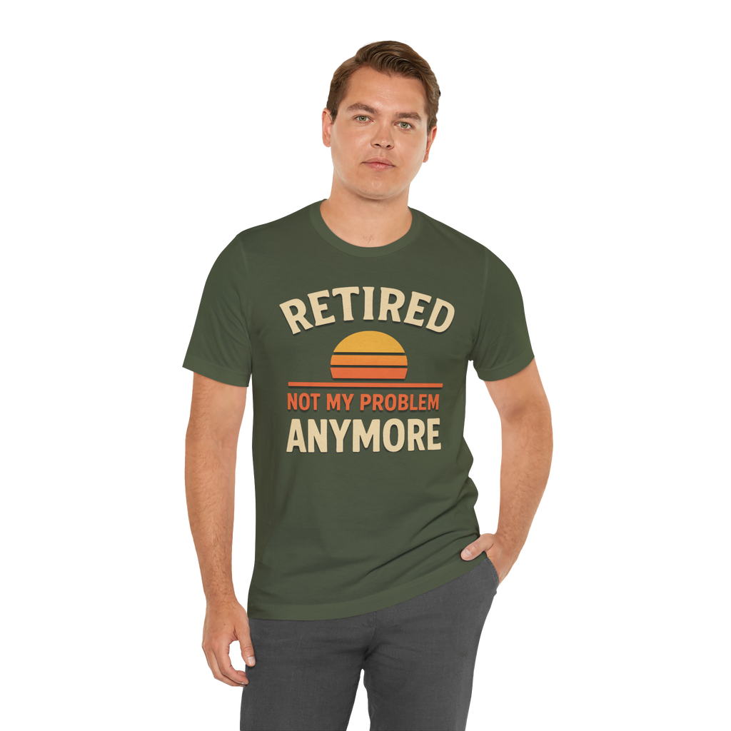 Man wearing olive-green t-shirt with RETIRED NOT MY PROBLEM ANYMORE and a sunset graphic.