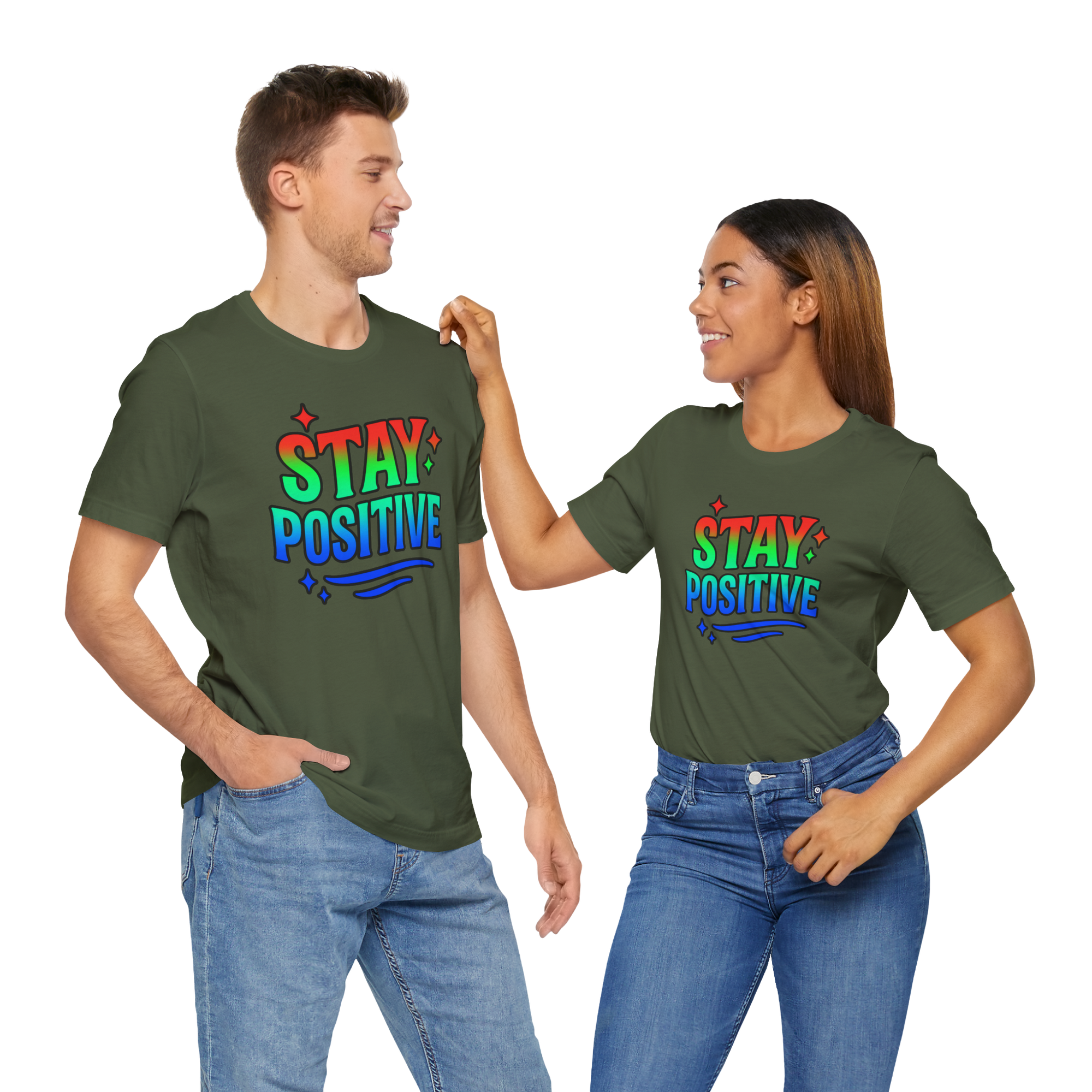 Two people wearing Stay Positive green T-shirts with rainbow text design.
