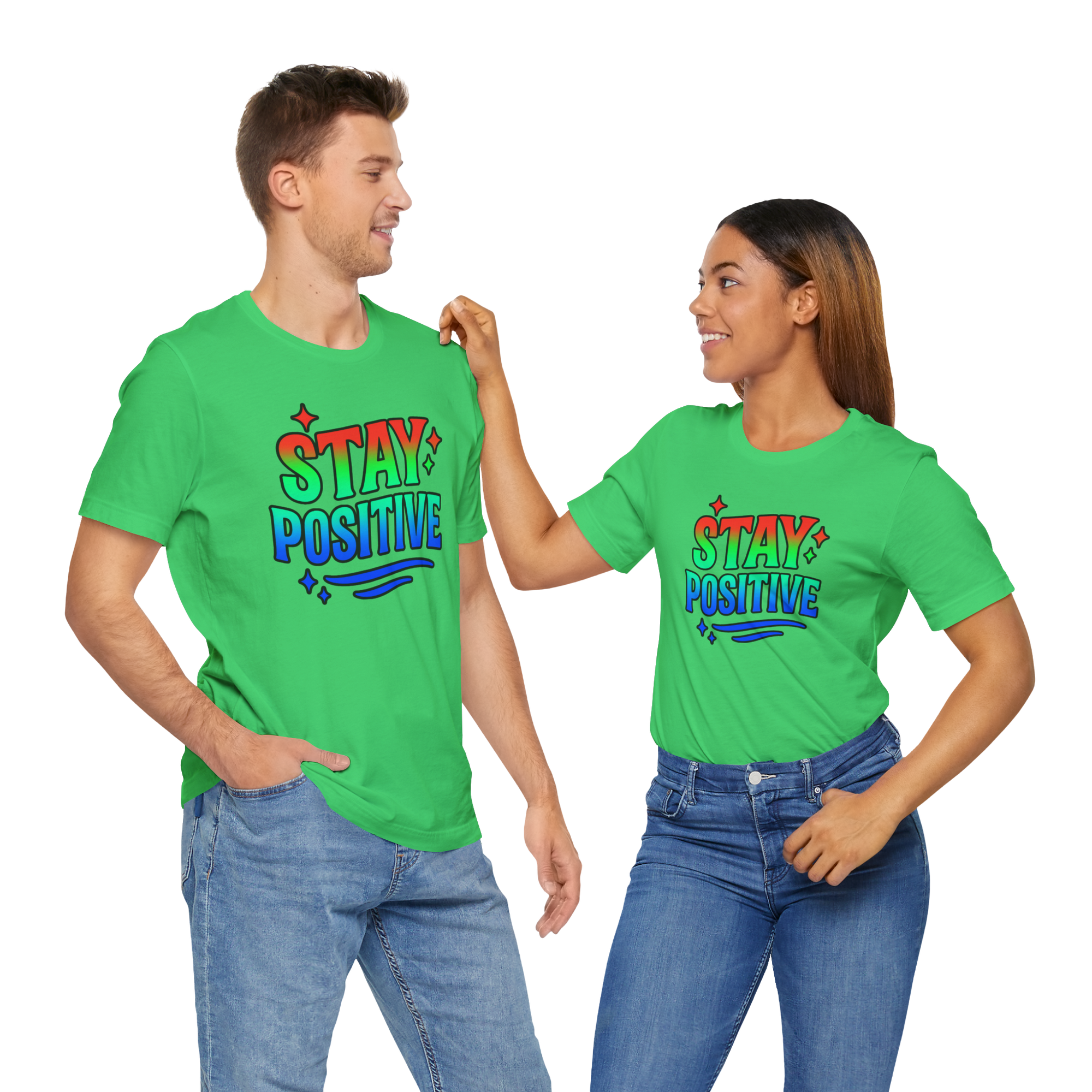 Two people in bright green Stay Positive t-shirts, smiling and posing together.
