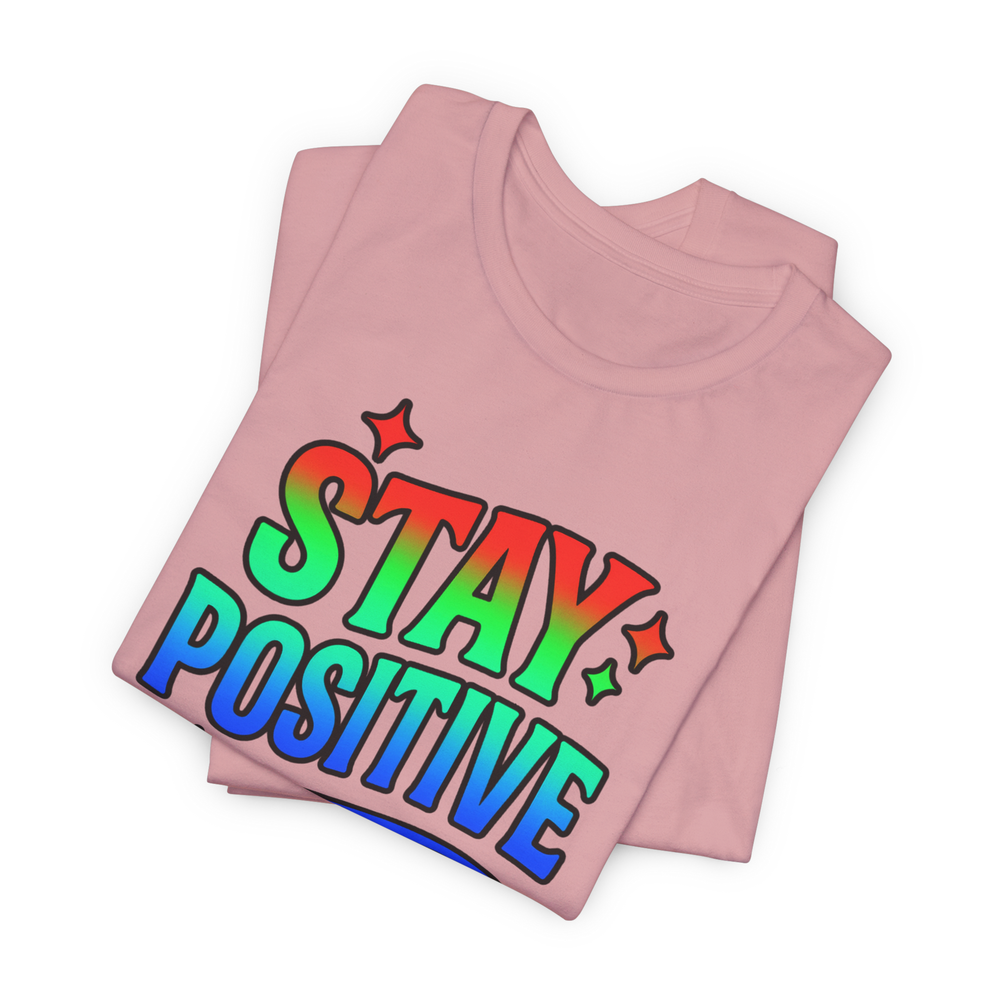 Pink t-shirt with Stay Positive in rainbow gradient lettering and star accents.