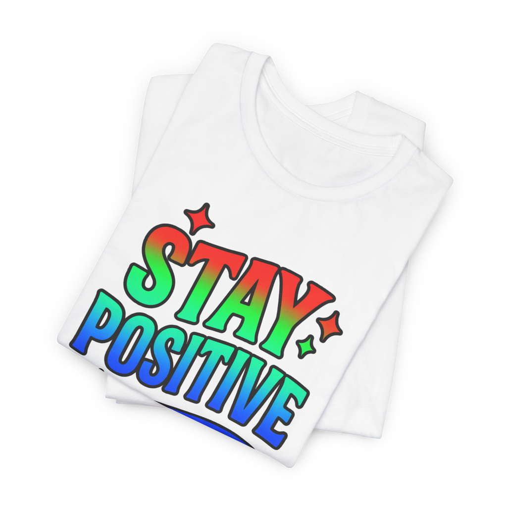 White T-shirt with rainbow Stay Positive text design on front.
