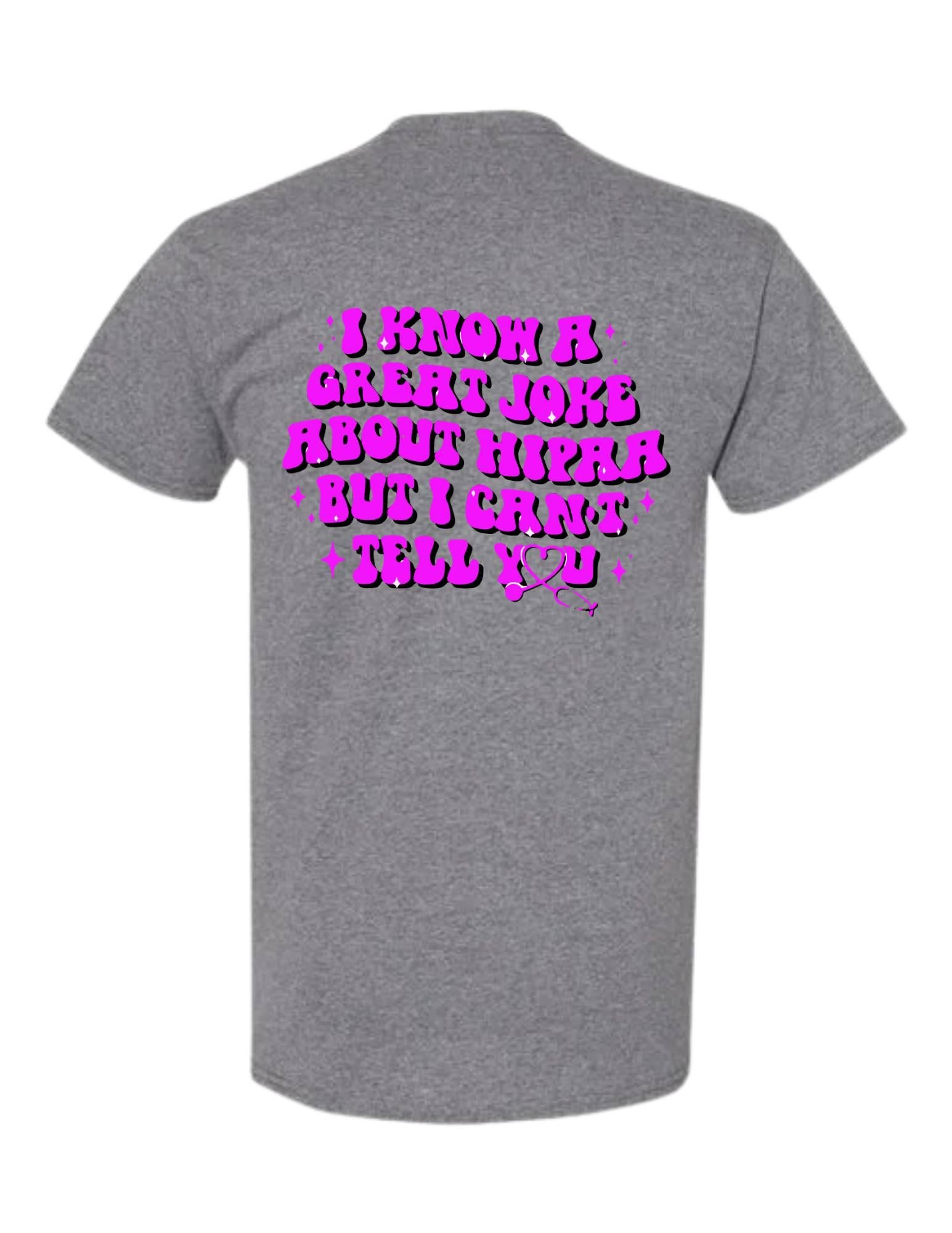 Gray t-shirt with pink text on a white background