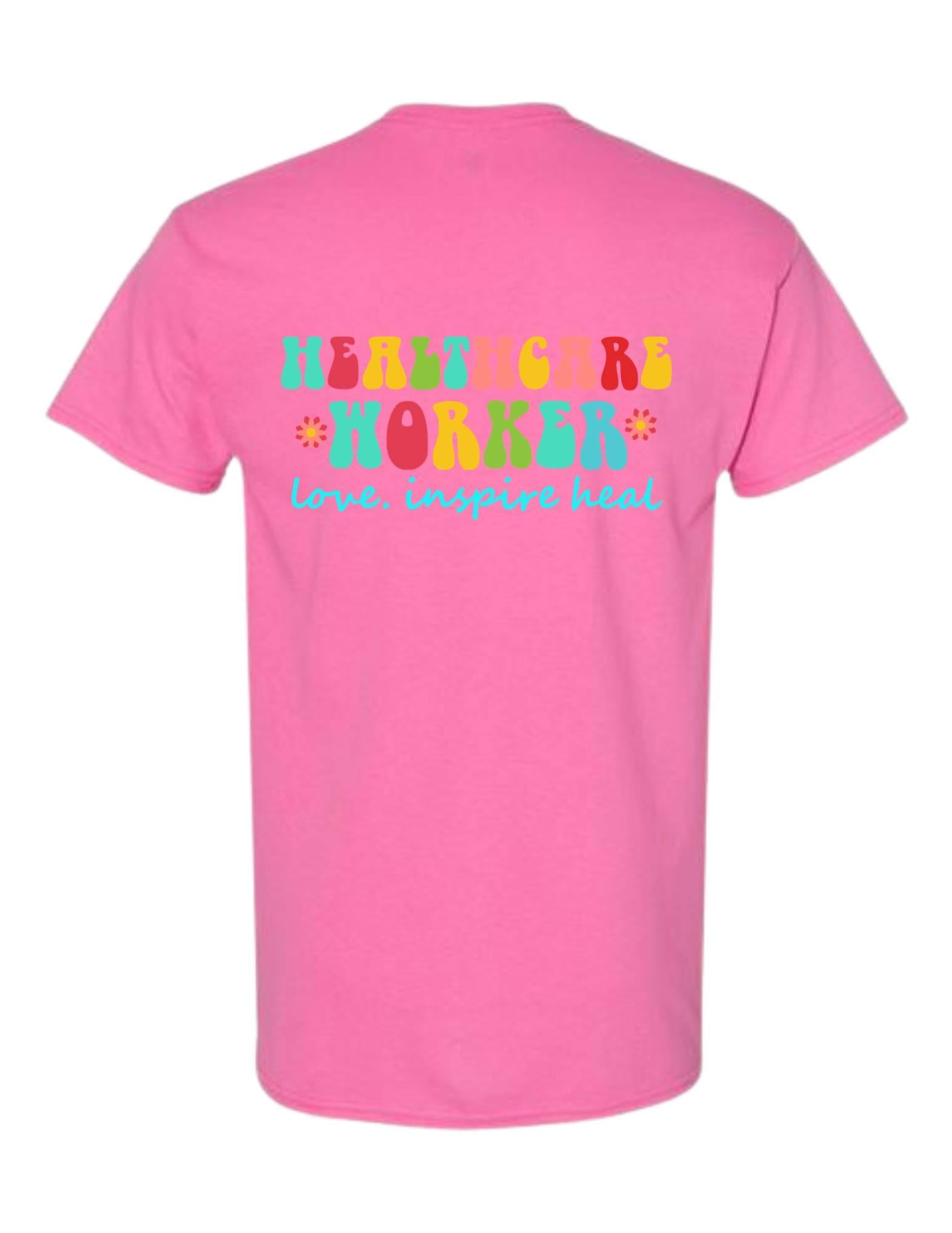 Pink t-shirt with 'Healthcare Worker' text on a white background