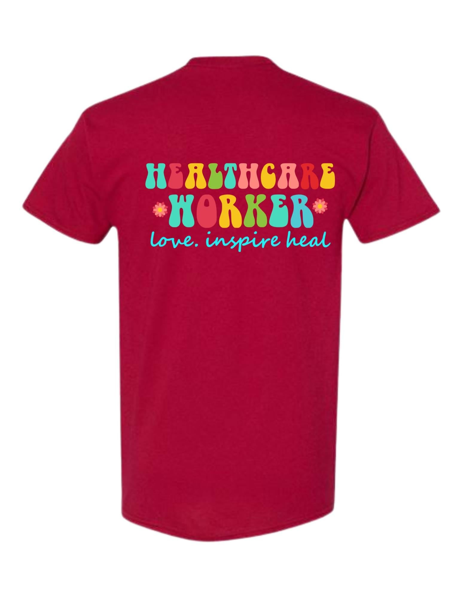 Red t-shirt with colorful 'HEALTHCARE WORKER' text on the back against a white background