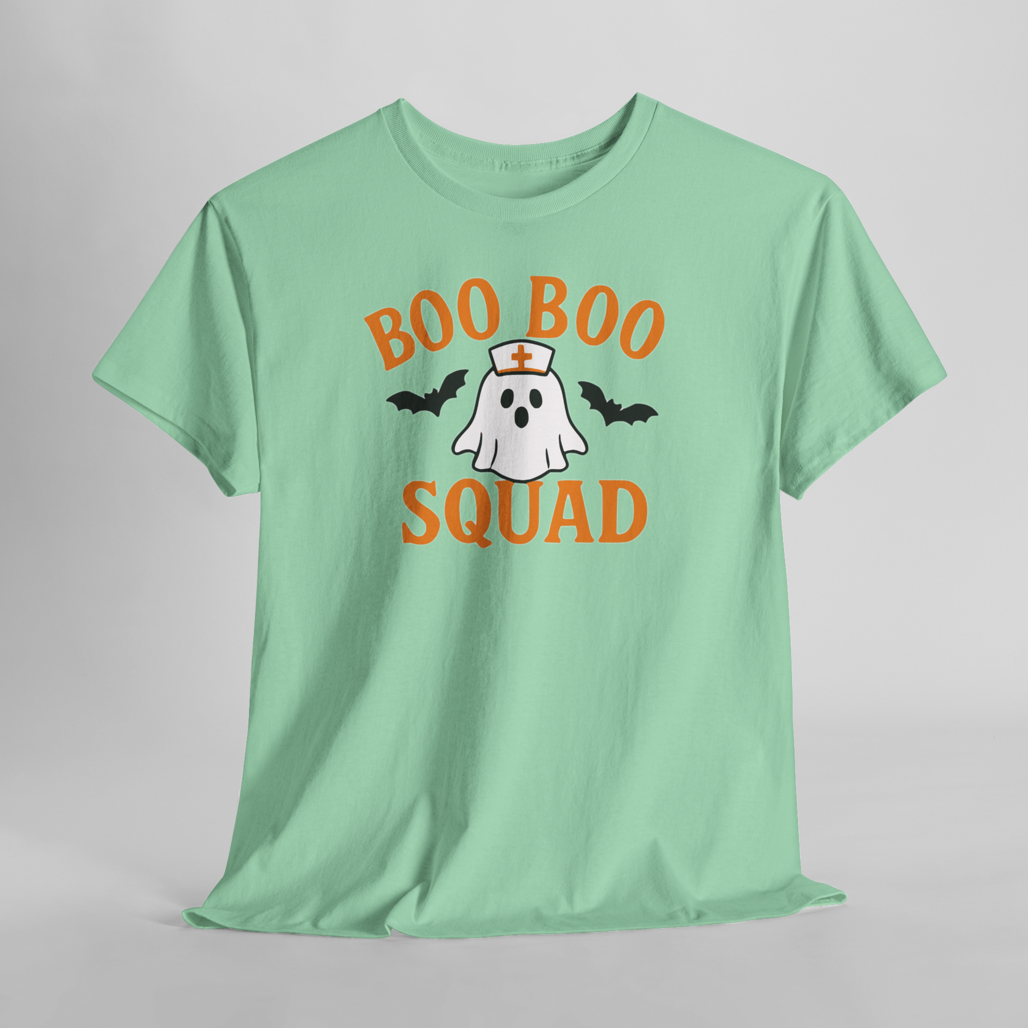 Mint green Gildan 5000 tee with orange Boo Boo Squad text, featuring a ghost in a nurse hat flanked by bats.