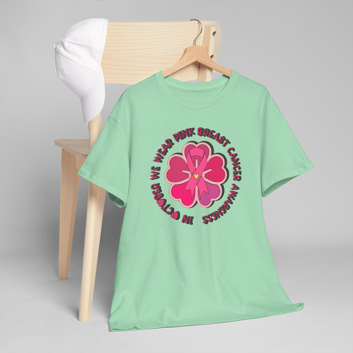 Mint green Gildan 5000 tee with pink flower and ribbon for breast cancer awareness in a circular text design.