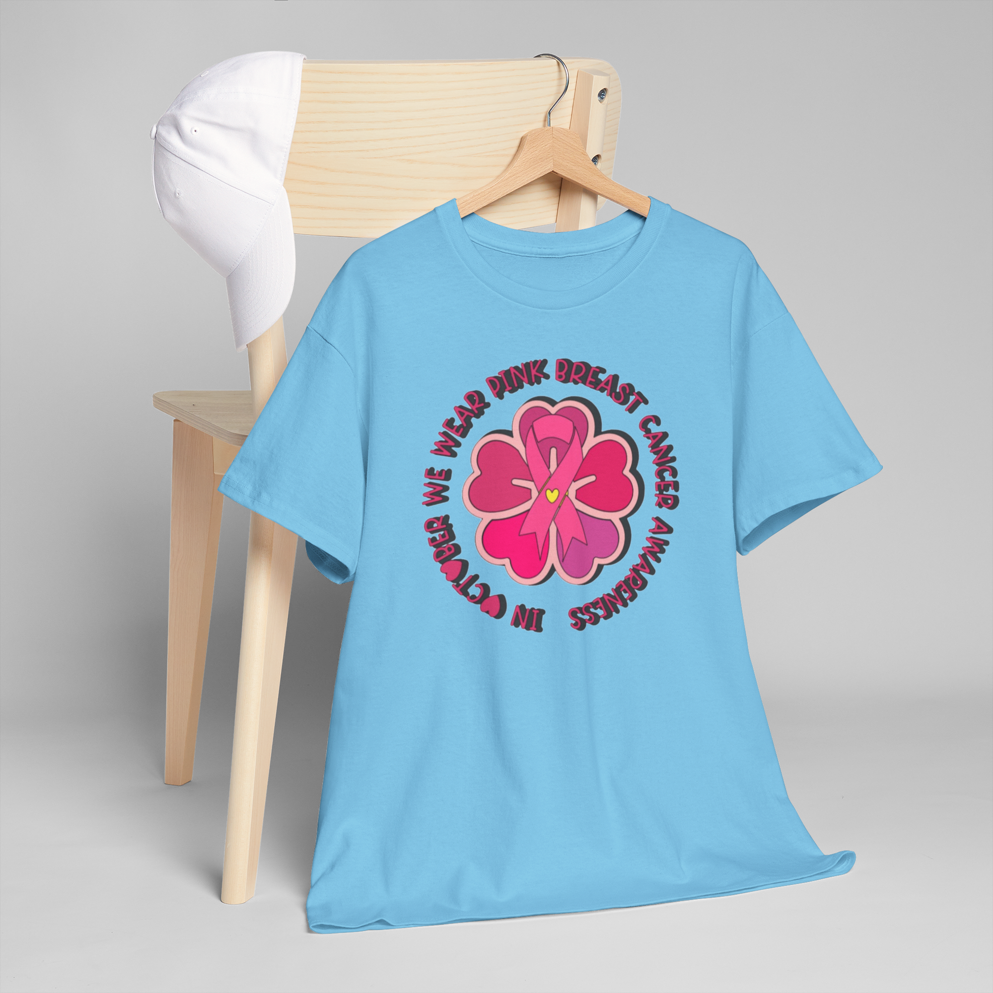 Light blue Gildan 5000 tee featuring pink flower with ribbon in a circular breast cancer awareness design.