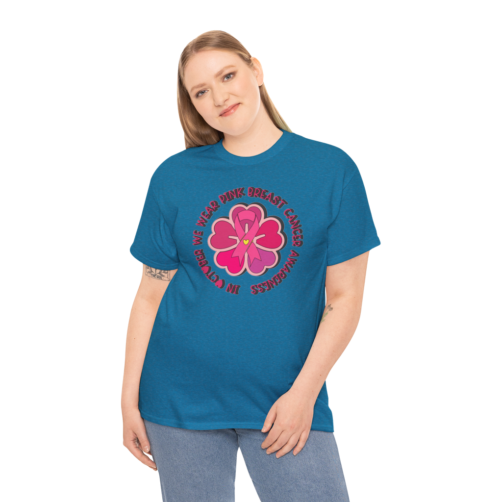 Woman wearing blue Gildan 5000 T-shirt featuring pink flower breast cancer awareness graphic.