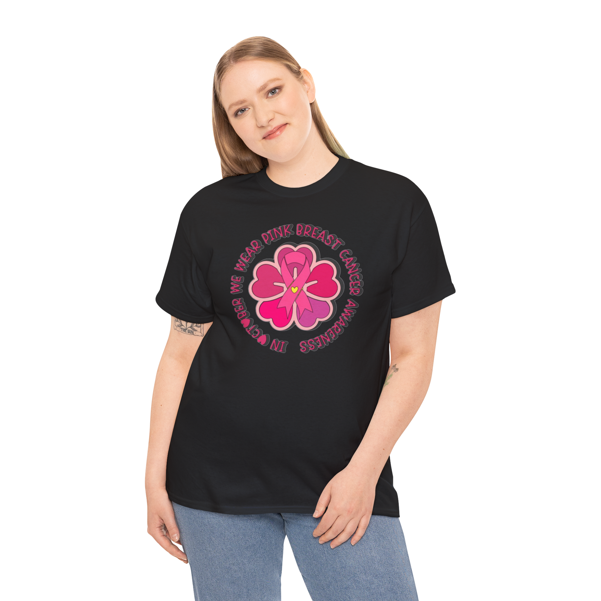 Pink flower breast cancer awareness tee on a woman wearing a black Gildan 5000 shirt