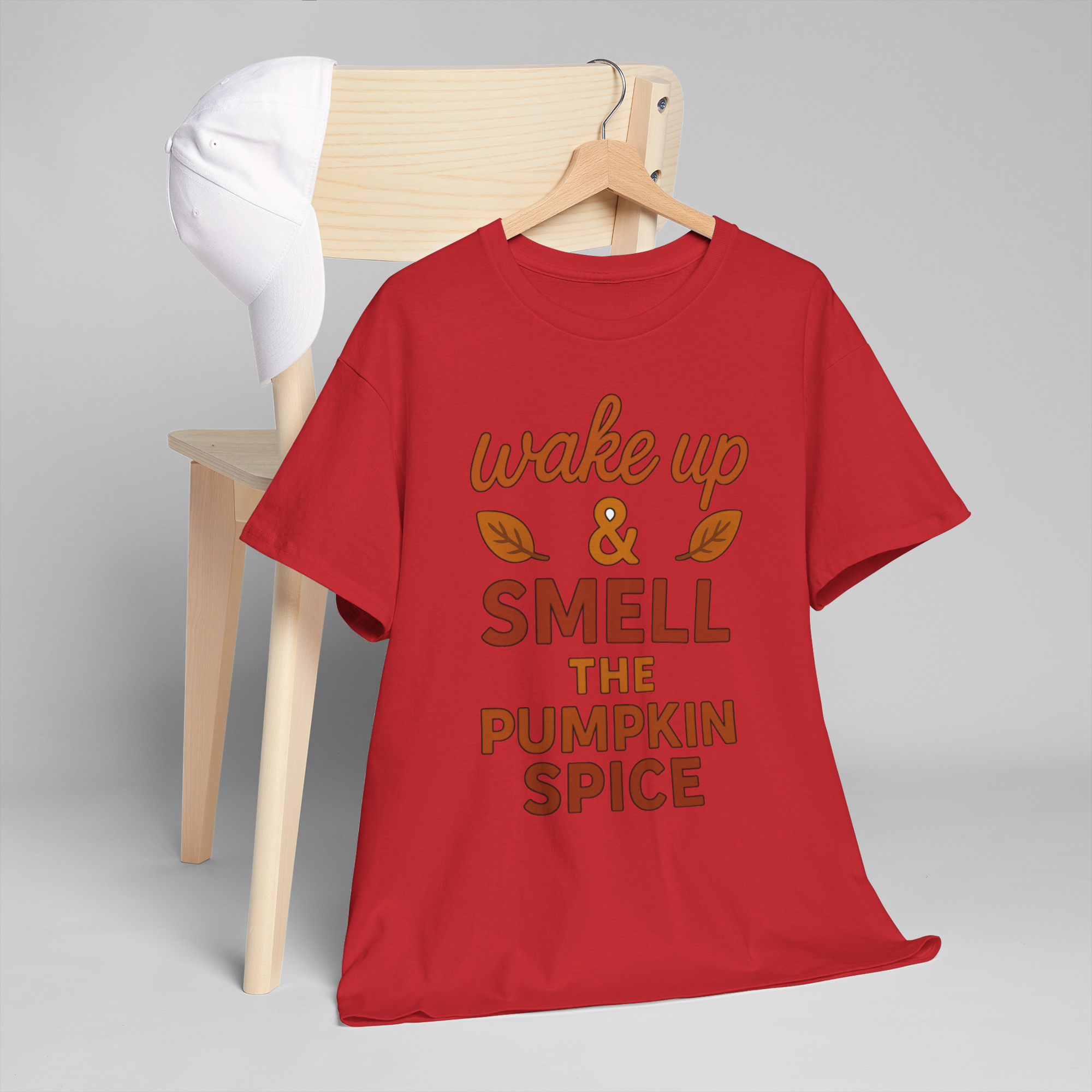 Red Gildan 5000 pumpkin spice T-shirt with 'wake up & smell the pumpkin spice' graphic.