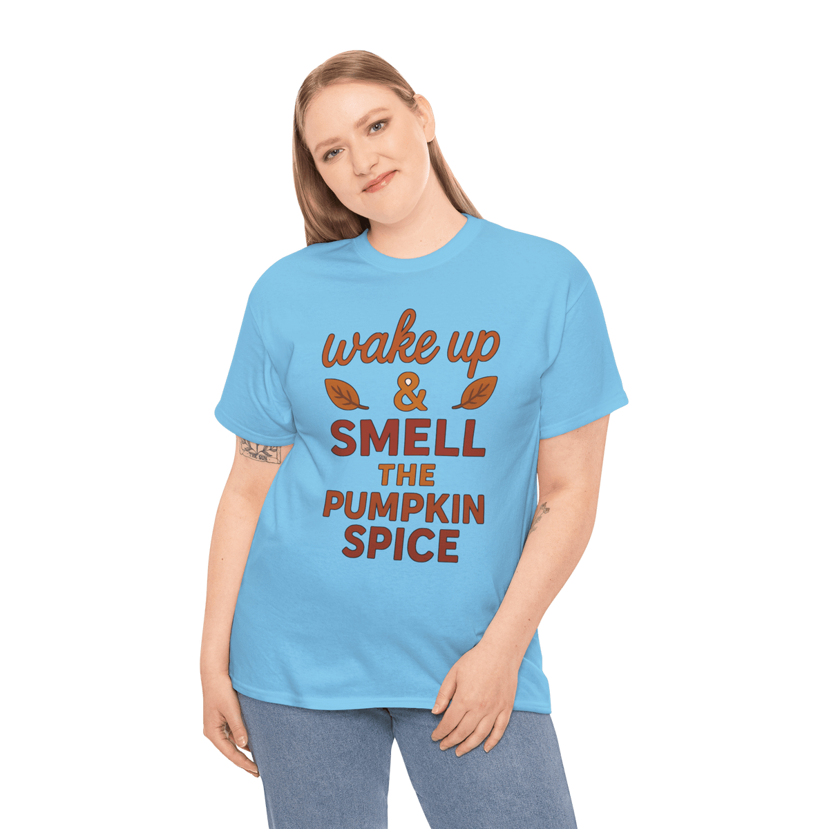 Model wearing gildan 5000 pumpkin spice T-shirt featuring wake up & smell the pumpkin spice message.
