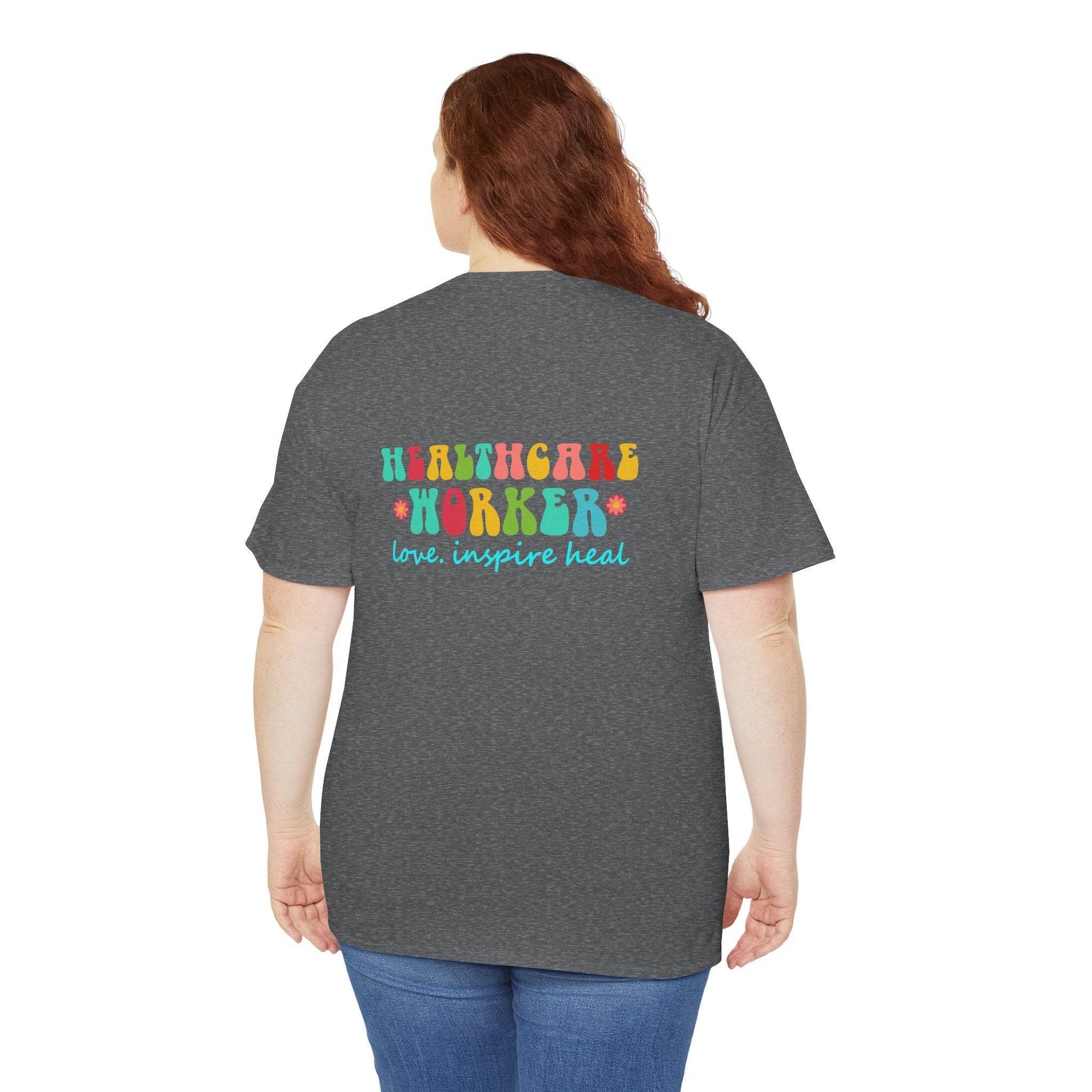 Back view of a charcoal gray Healthcare Workers T-Shirt with HEALTHCARE WORKER graphic and love inspire heal script.
