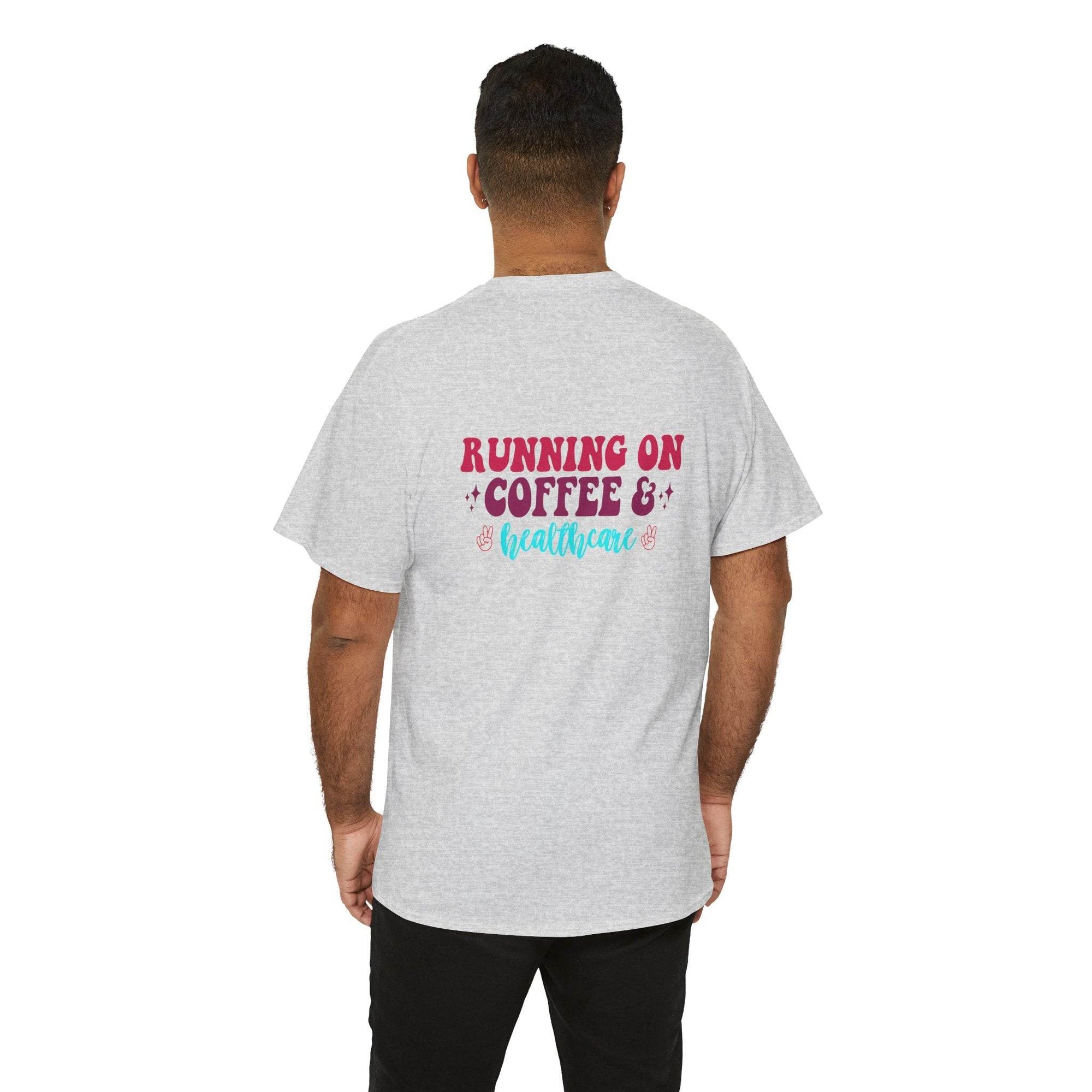 Back view of a person wearing a light gray T-shirt with 'Running on Coffee & healthcare' in pink and blue.