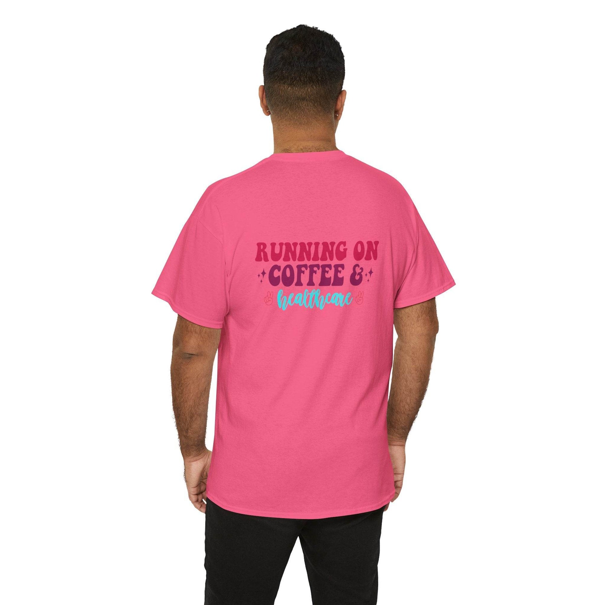 Back design on pink t-shirt reading RUNNING ON COFFEE & healthcare in magenta and teal script.