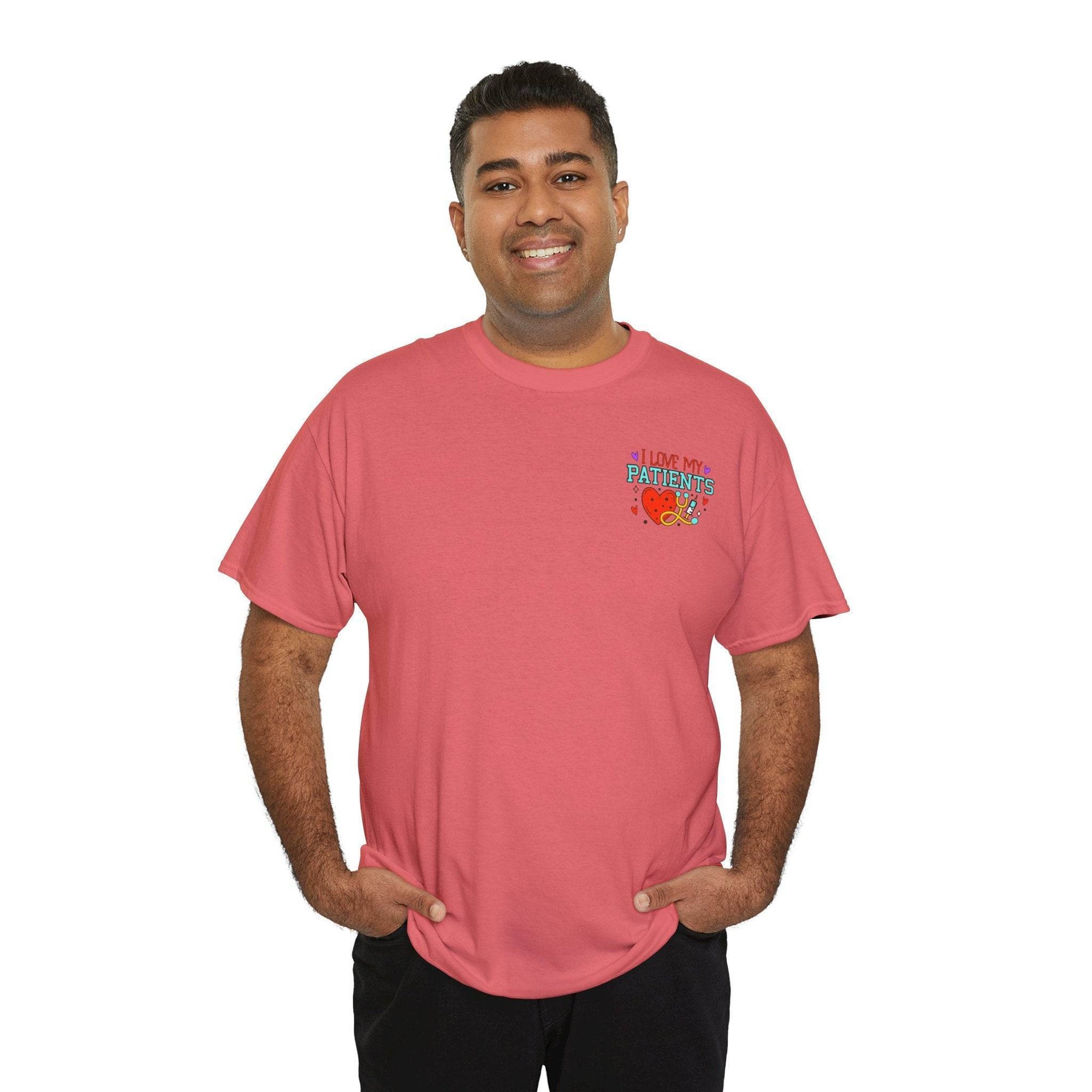 Man in pink t-shirt with I Love My Patients graphic, celebrating healthcare workers fueled by coffee.