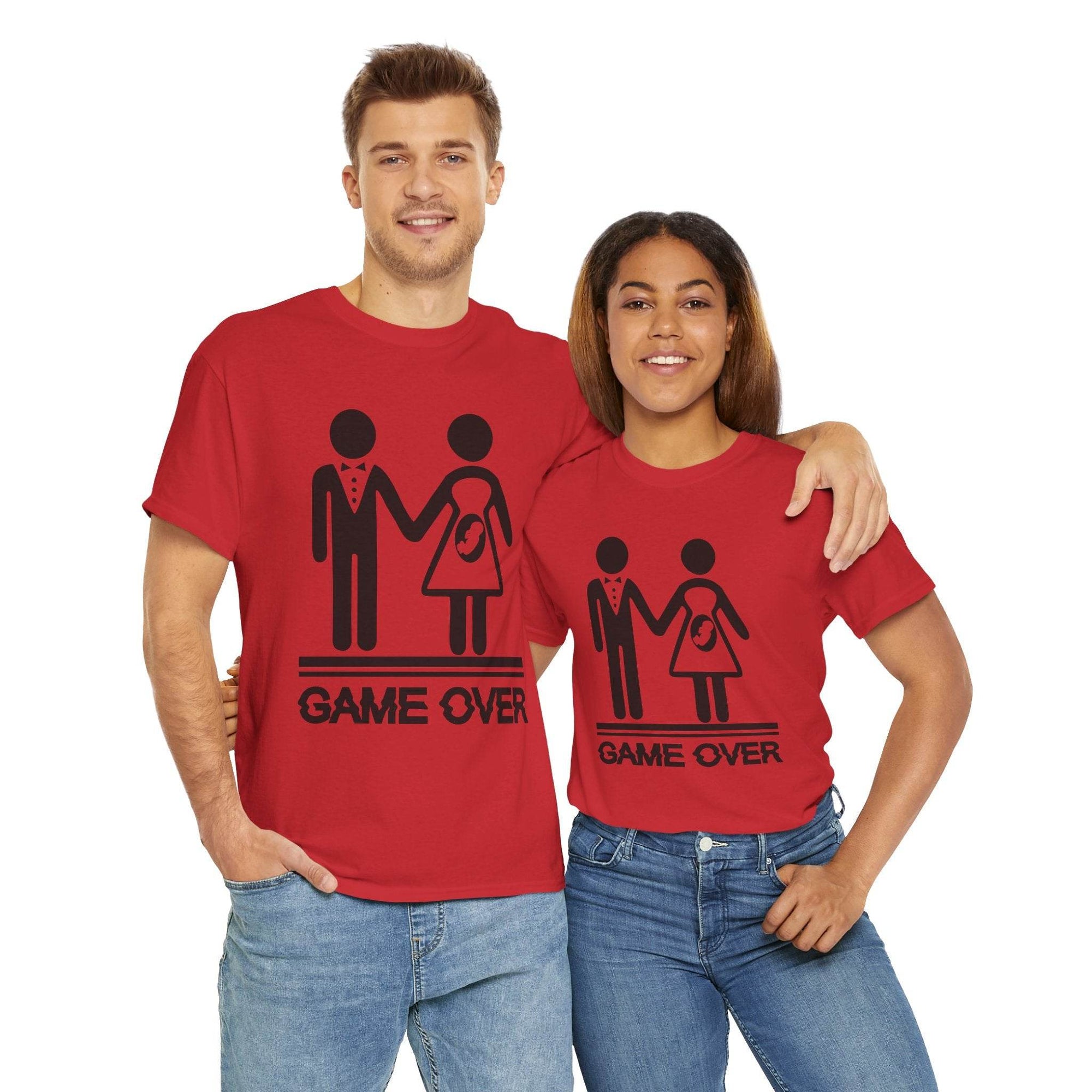 Game Over funny wedding & pregnancy reveal T-shirt on couple; stick figures with baby icon, red Gildan 5000.