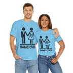Couple wearing blue Game Over wedding and pregnancy reveal T‑shirts with stick-figure family and baby icon.