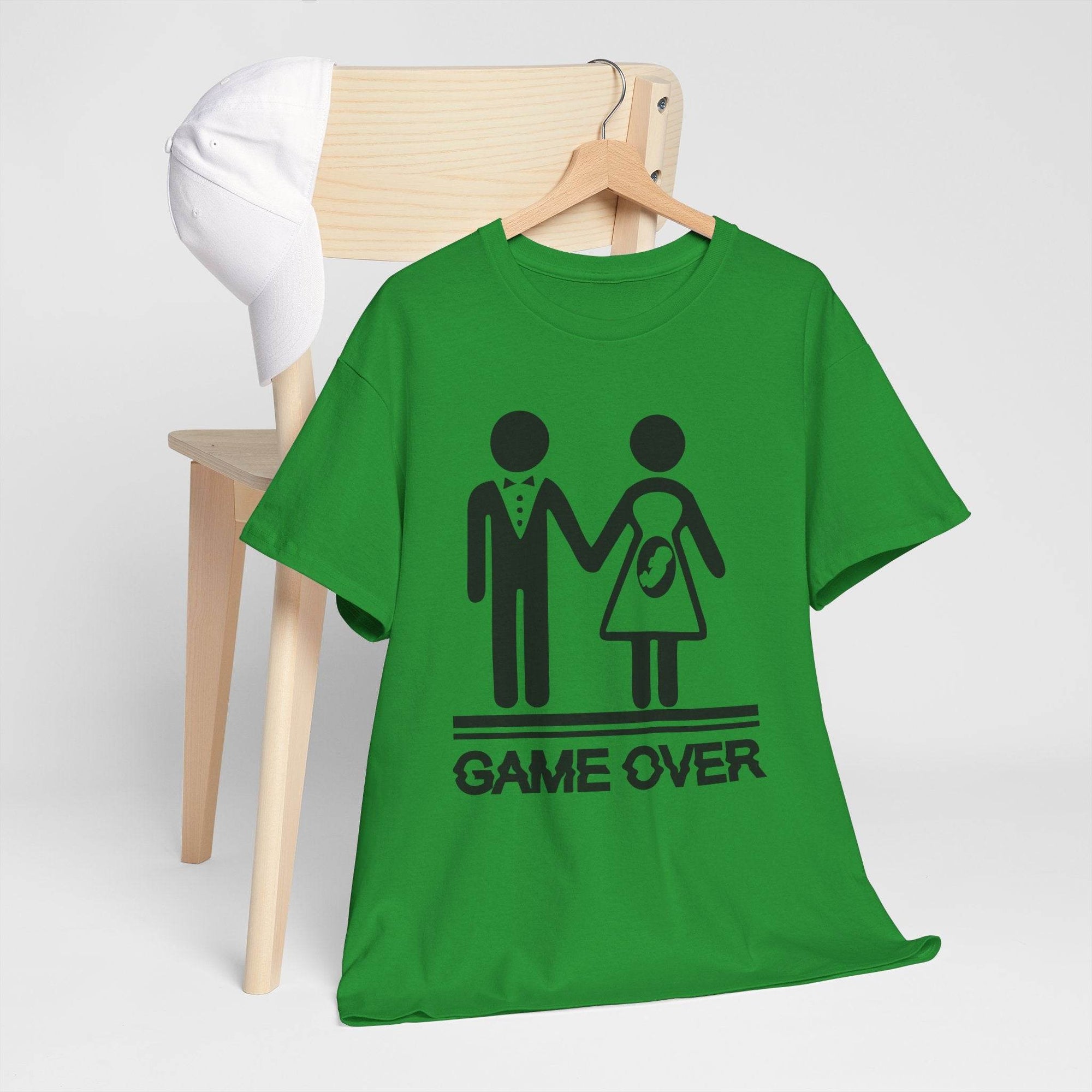 Green tee featuring a stick-figure couple and baby-on-board icon, with GAME OVER printed in bold.